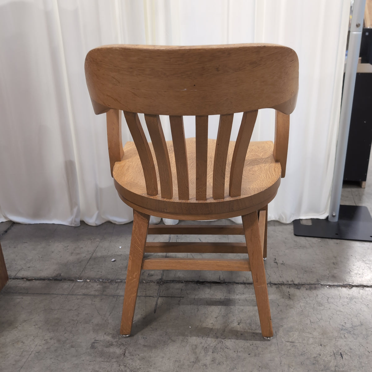Golden Oak Curved Back Arm Chair with Slatted Spindles