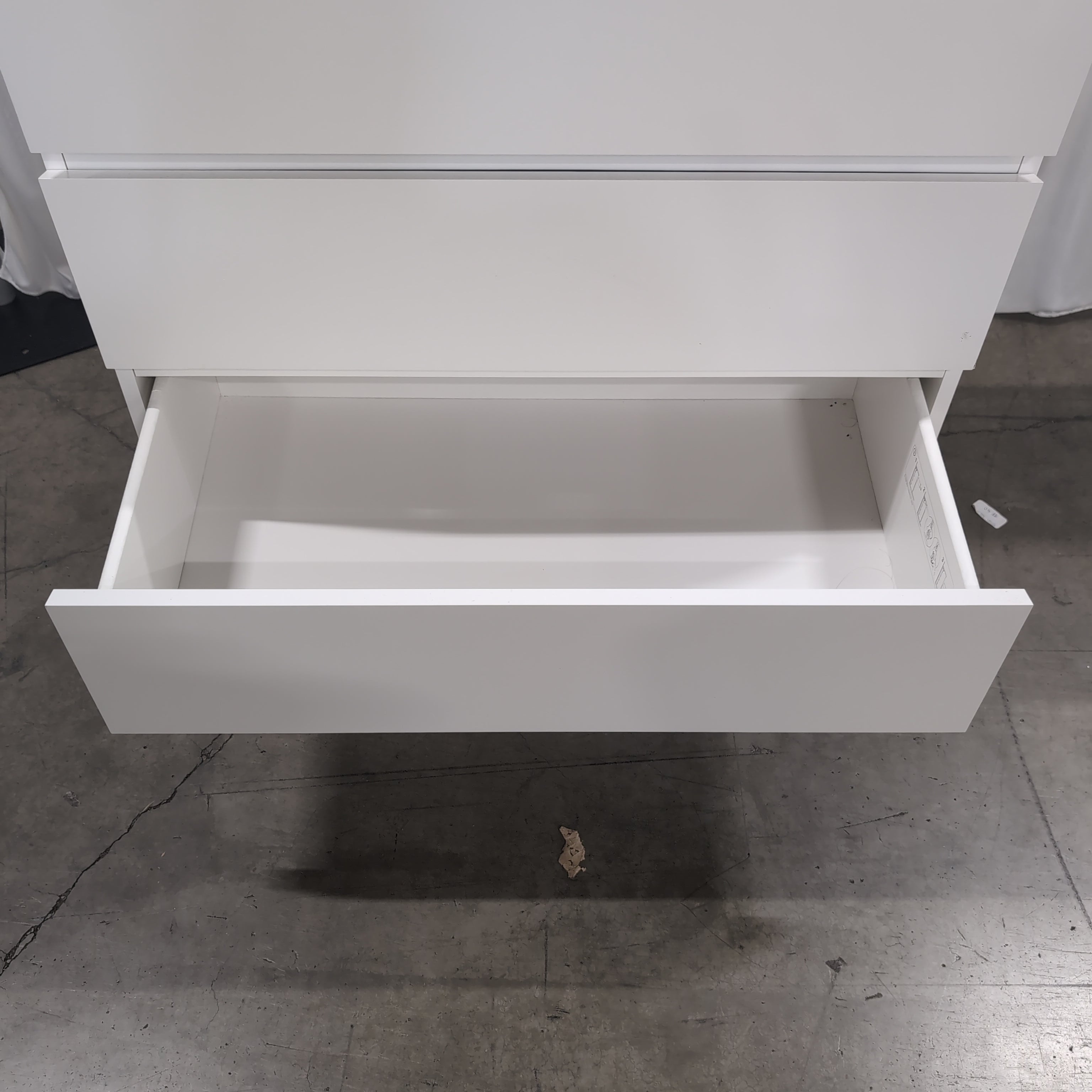 White Laminate Four-Drawer Dresser