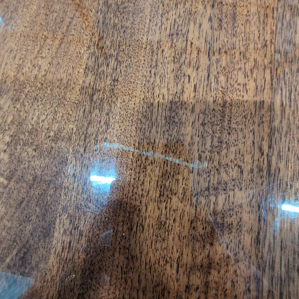 Chestnut brown dining table with 6 matching chairs