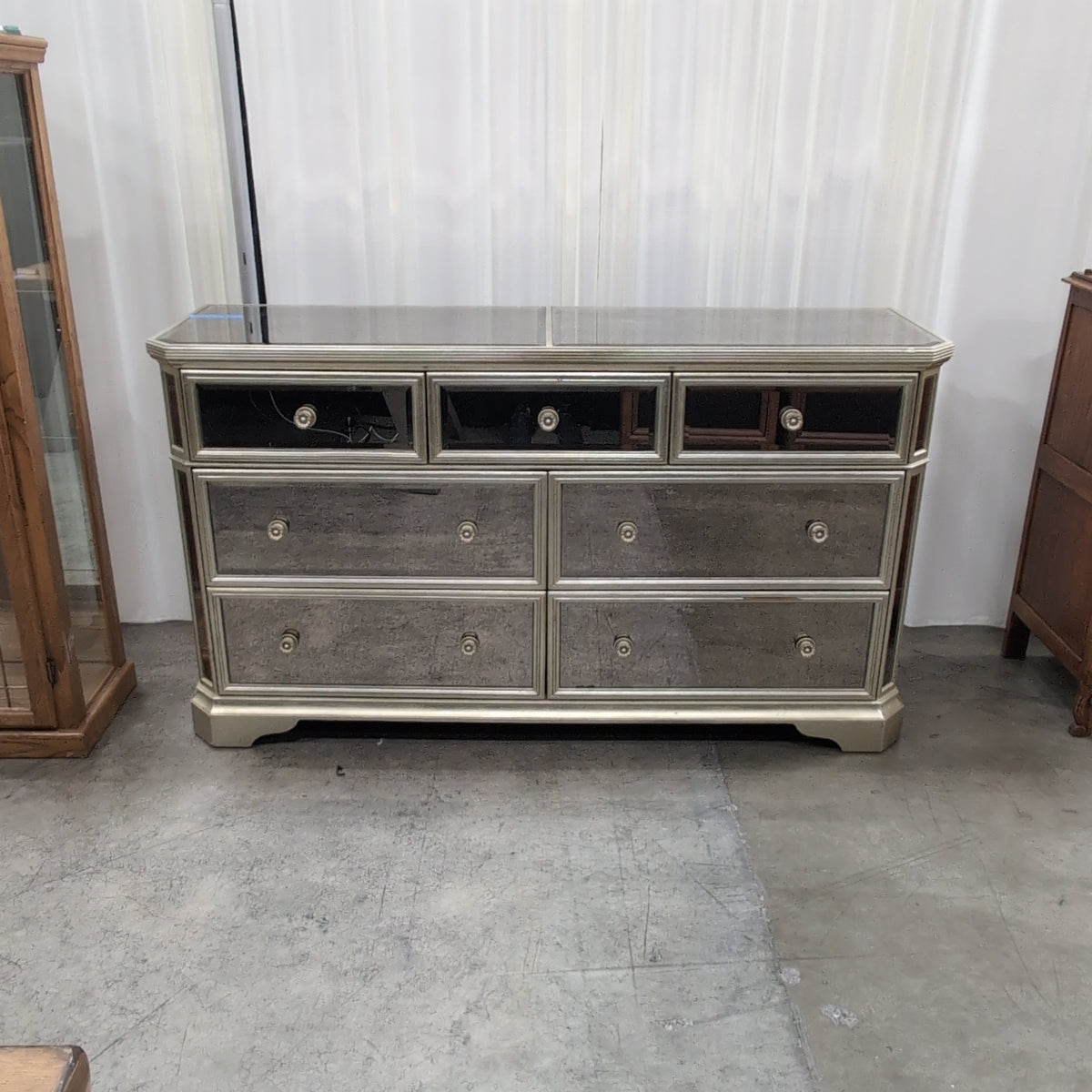Champagne Mirrored Seven-Drawer Dresser with Ornate Pulls