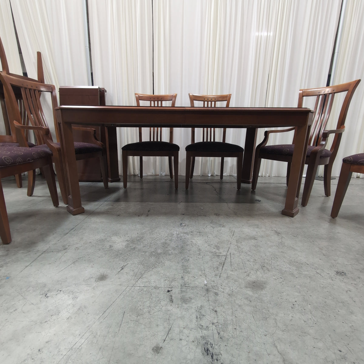 Dark Stained Wood Dining Table with Chamfered Corners