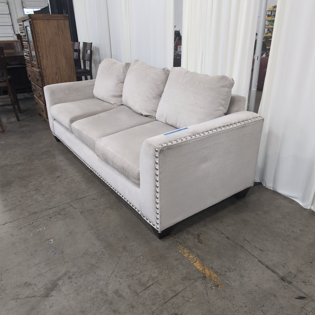 Light Beige Microfiber Couch with Nailhead Trim