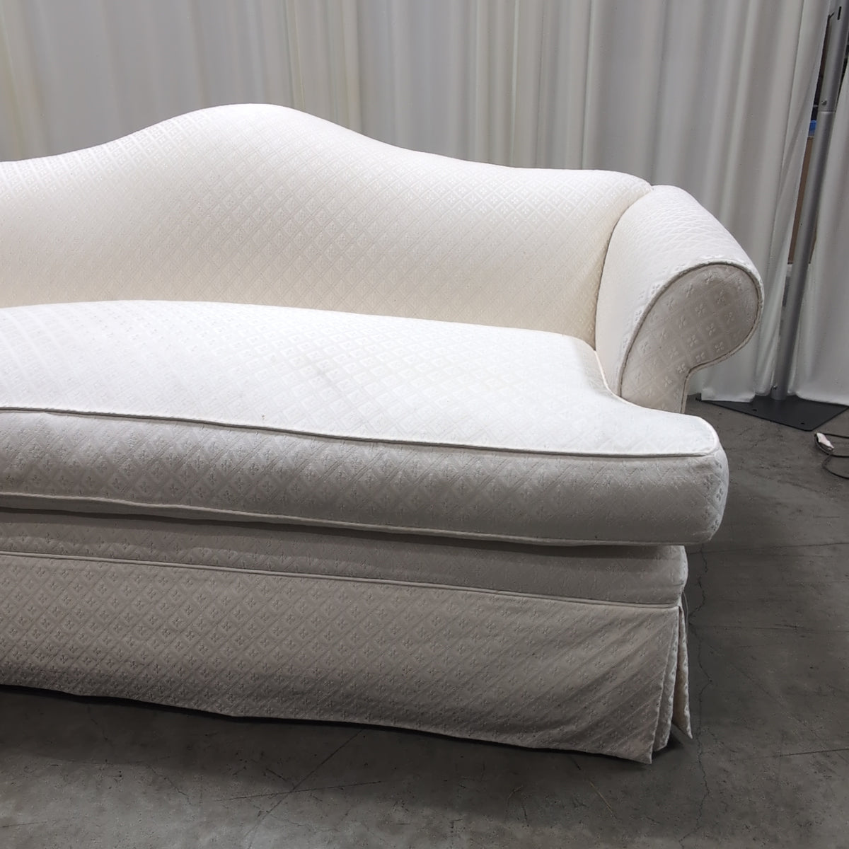 Cream Patterned Fabric Loveseat with Rolled Arms