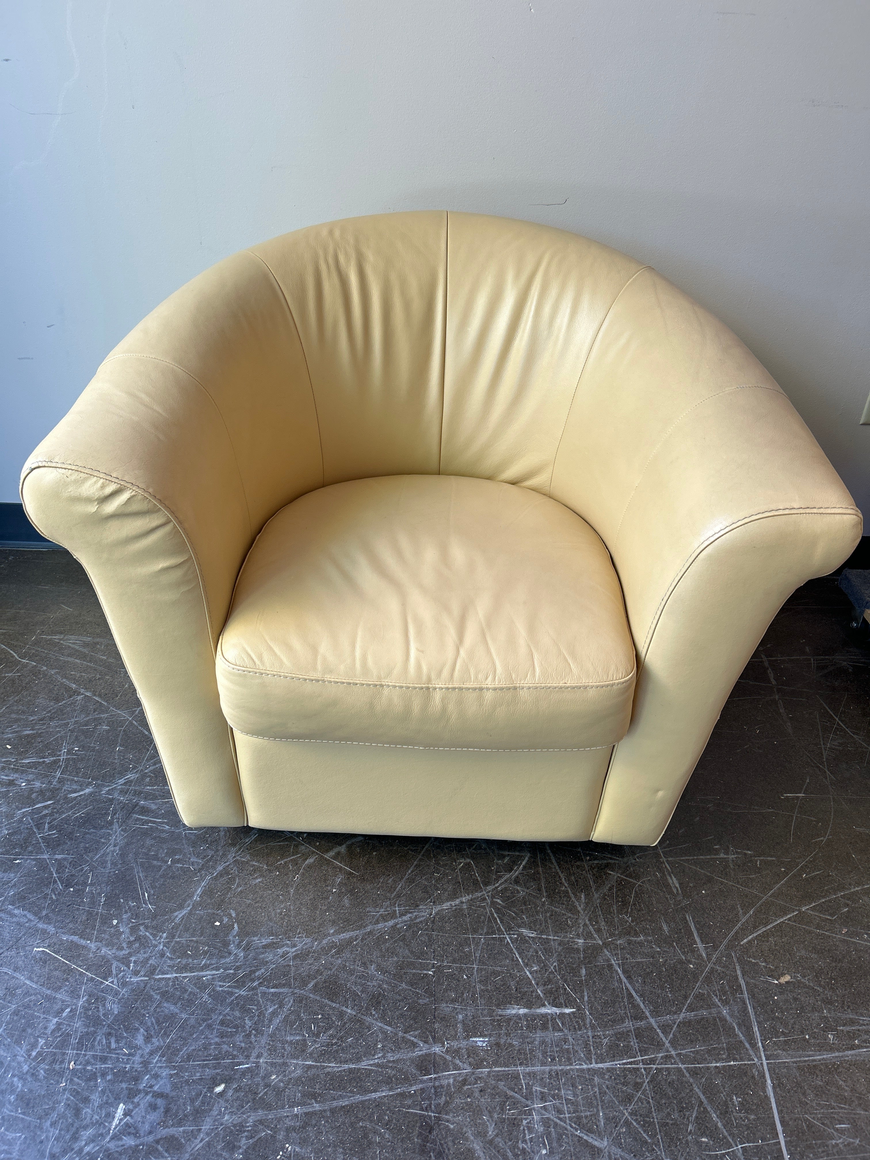 Butter Yellow Colored Leather Swivel Chair