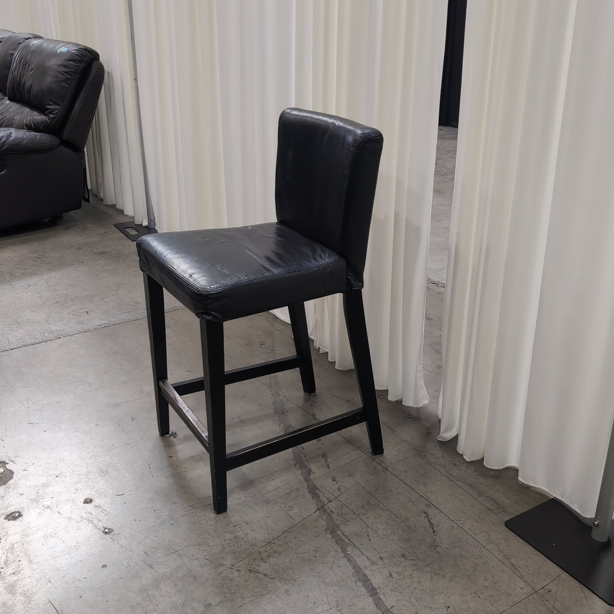 IKEA Brand Modern Black Faux Leather Bar Stool with Metal Footrest
