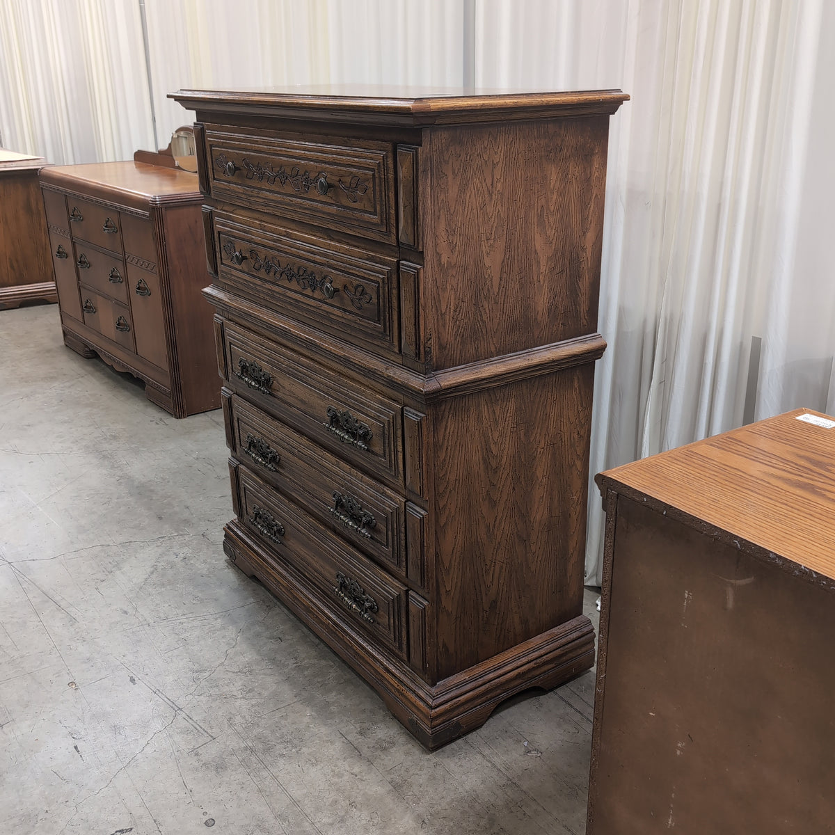 Traditional Brown Wood Five-Drawer Dresser with Ornate Hardware