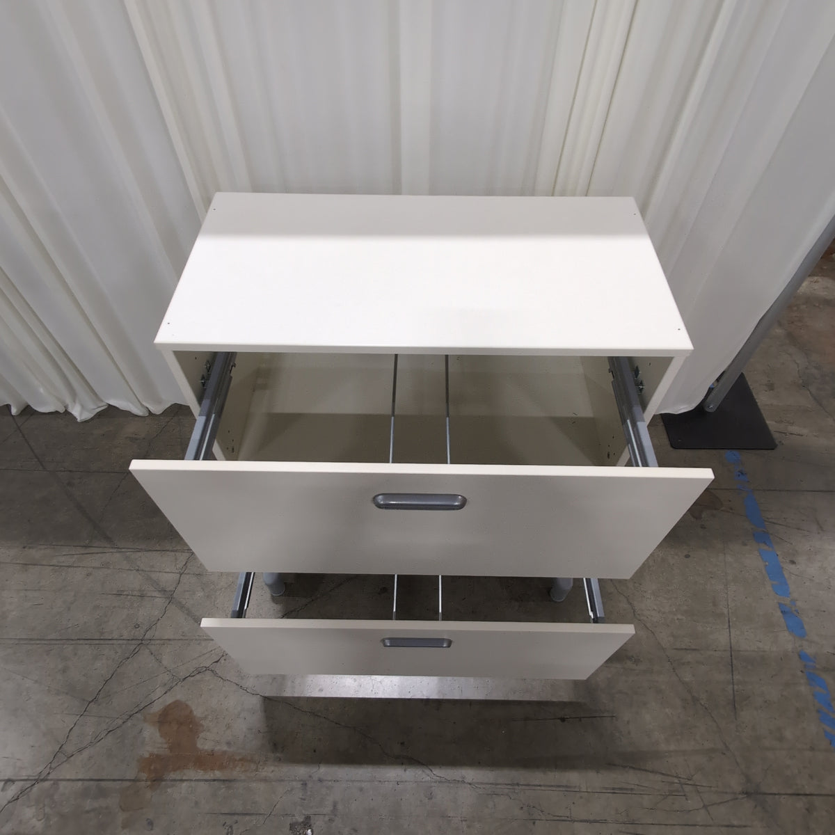 Light Gray Three-Drawer Dresser with Silver Pulls
