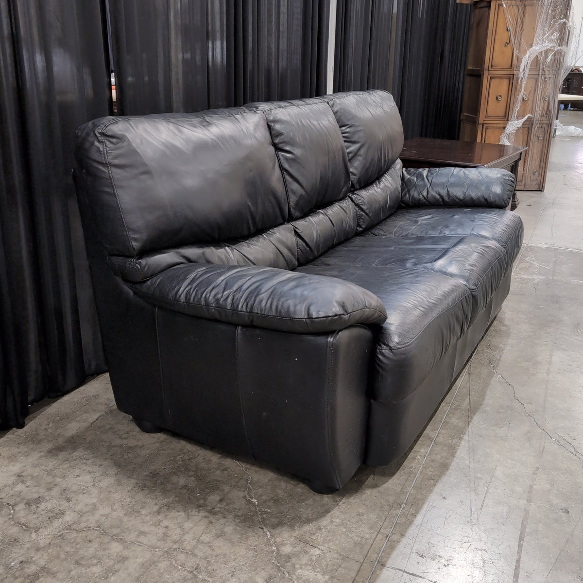 Black Rolled Arm Three-Cushion Couch in Leather