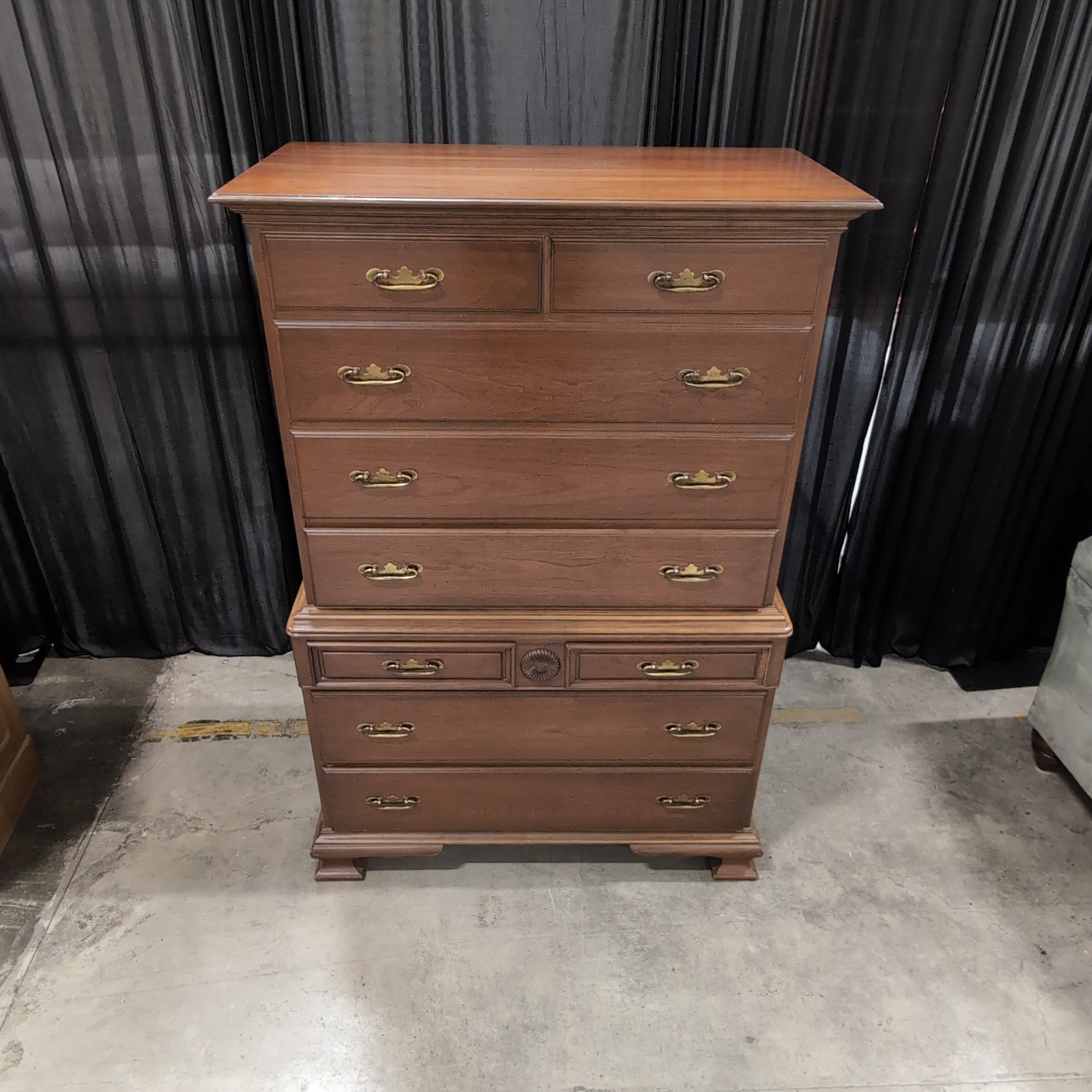 Traditional Cherry Stained Wood Tall Dresser with Ornate Hardware