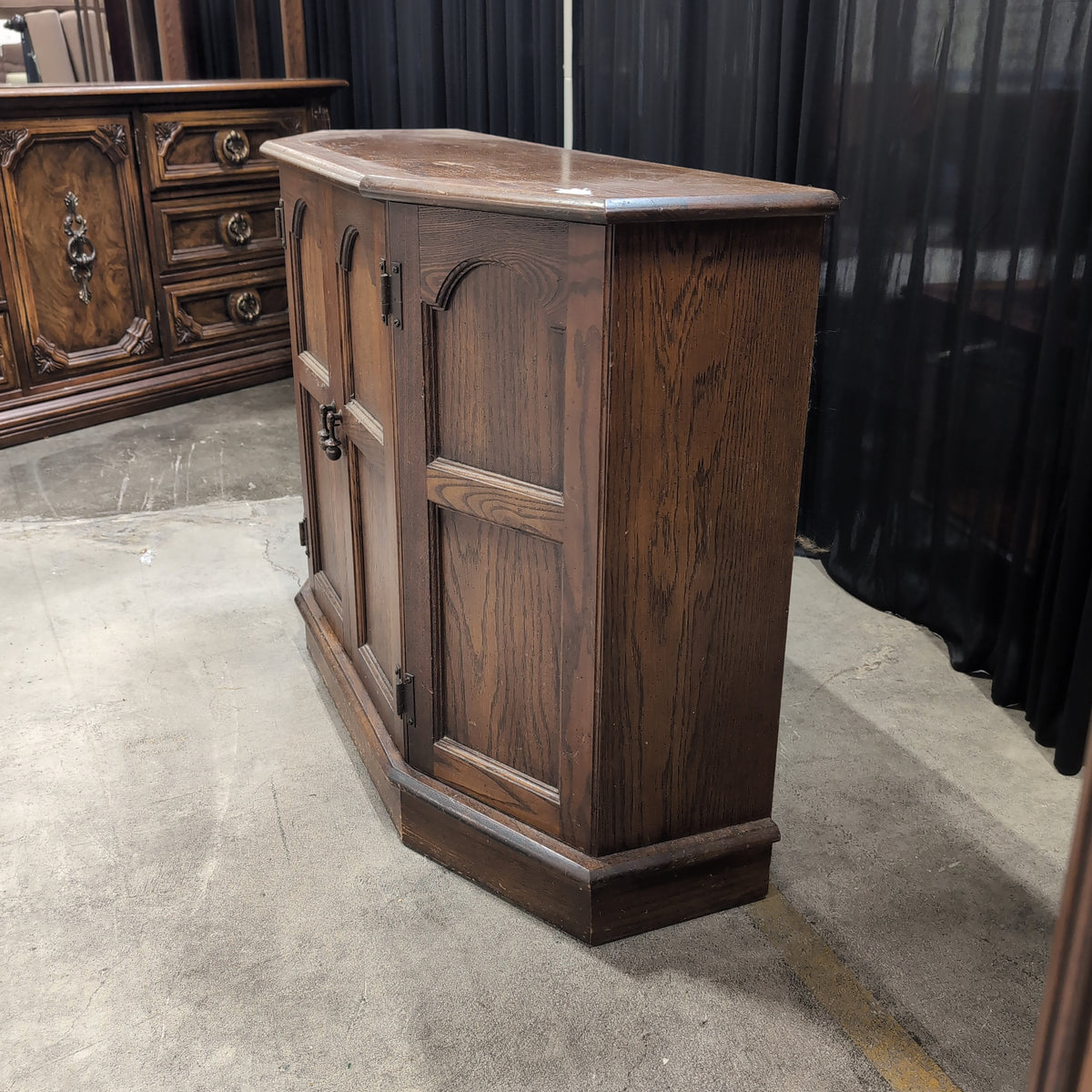 Dark Wood Corner Cabinet with Arched Panels