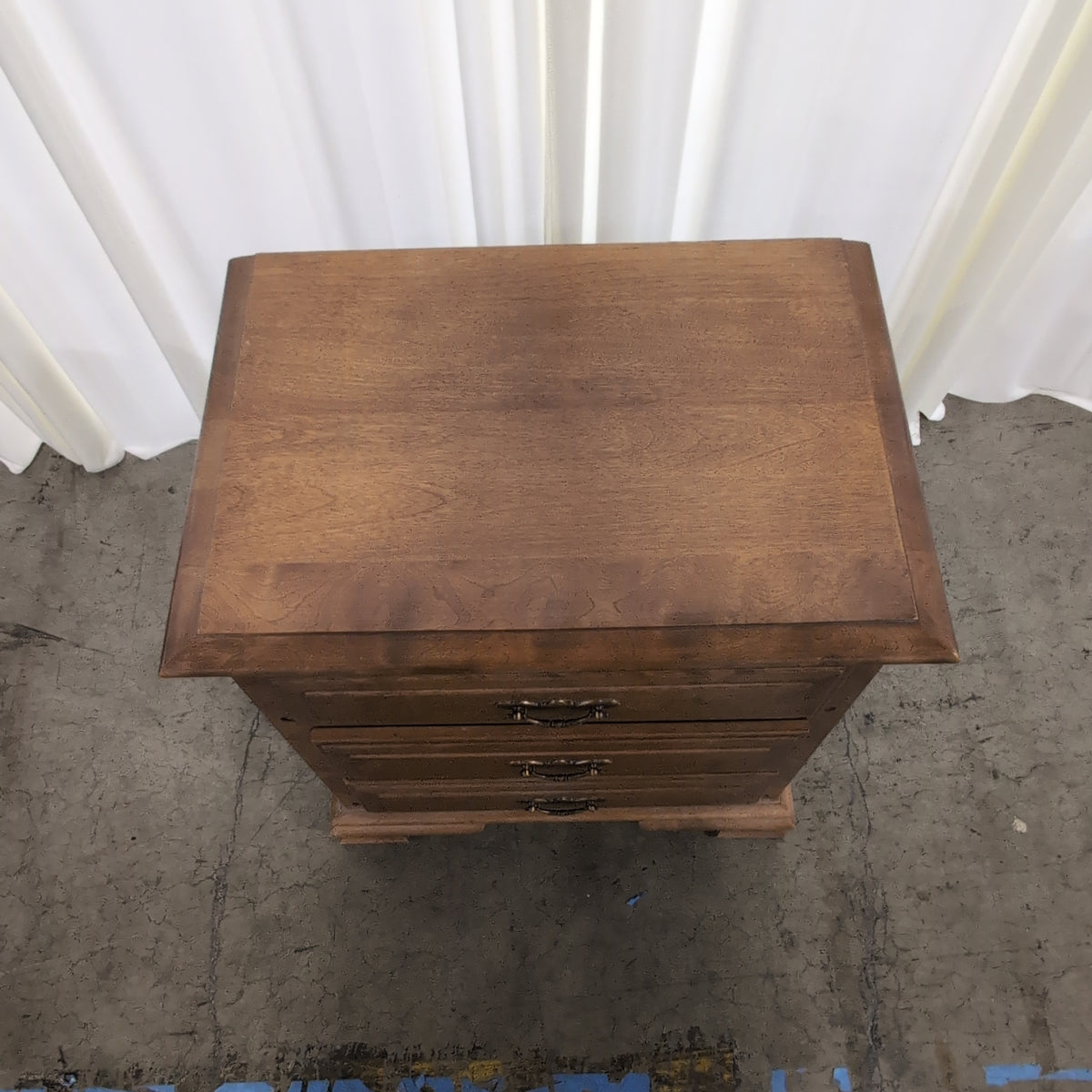Traditional Brown Wood Nightstand with Three Drawers