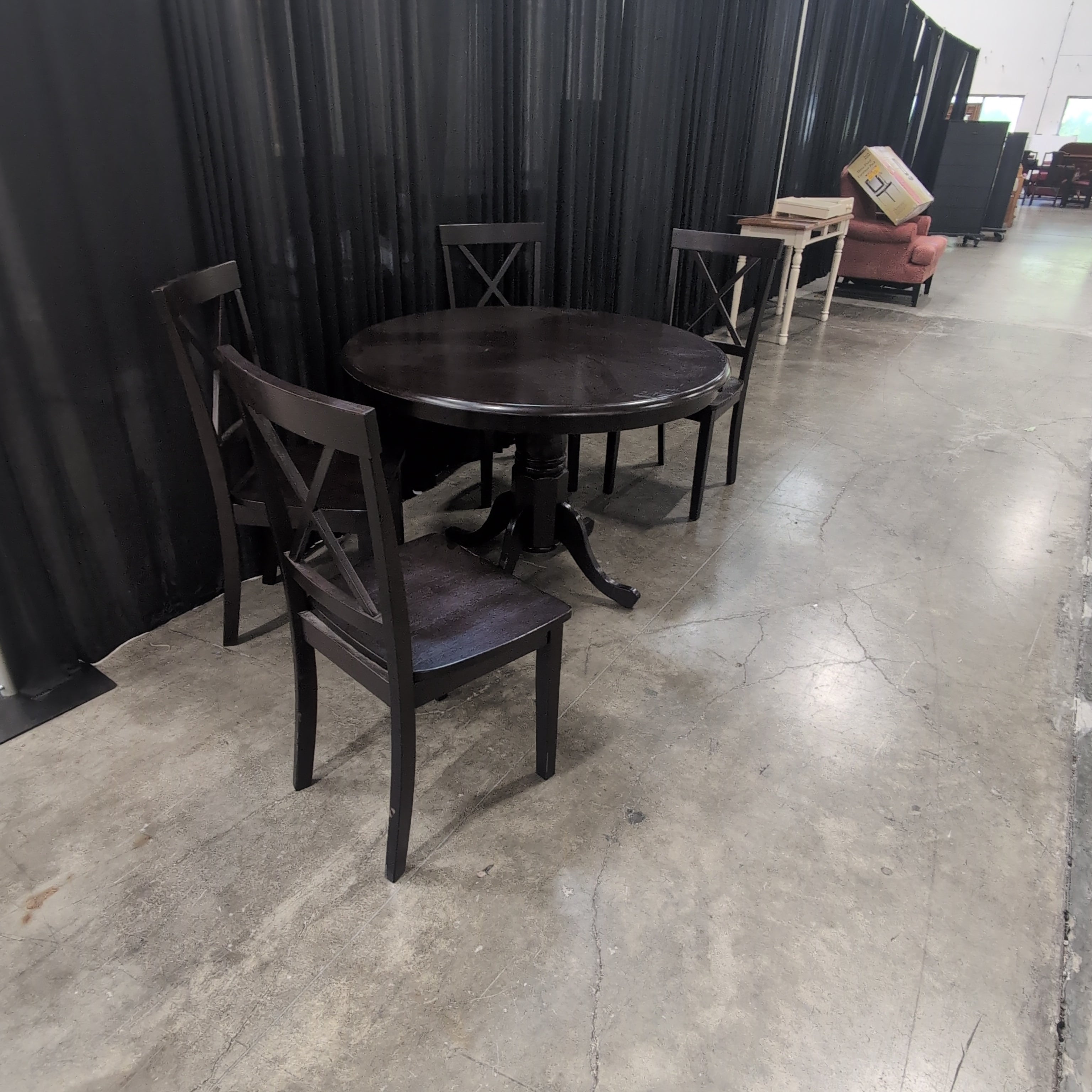 Dark Brown Wood Round Dining Table with X-Back Chairs
