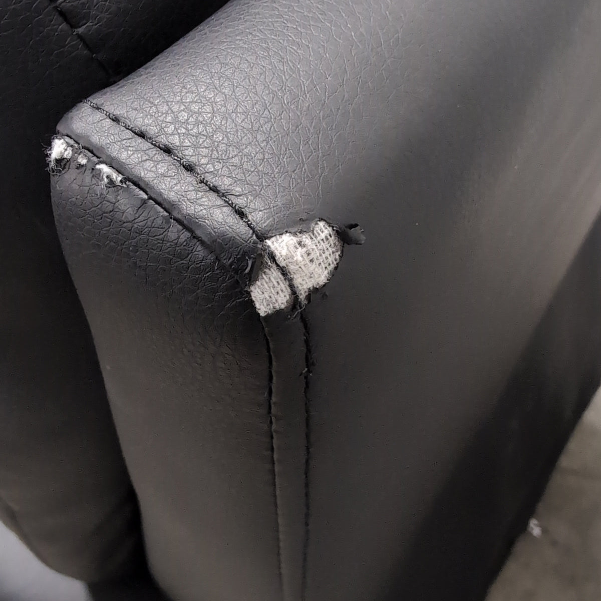 Padded Black Faux Leather Recliner with Cup Holders