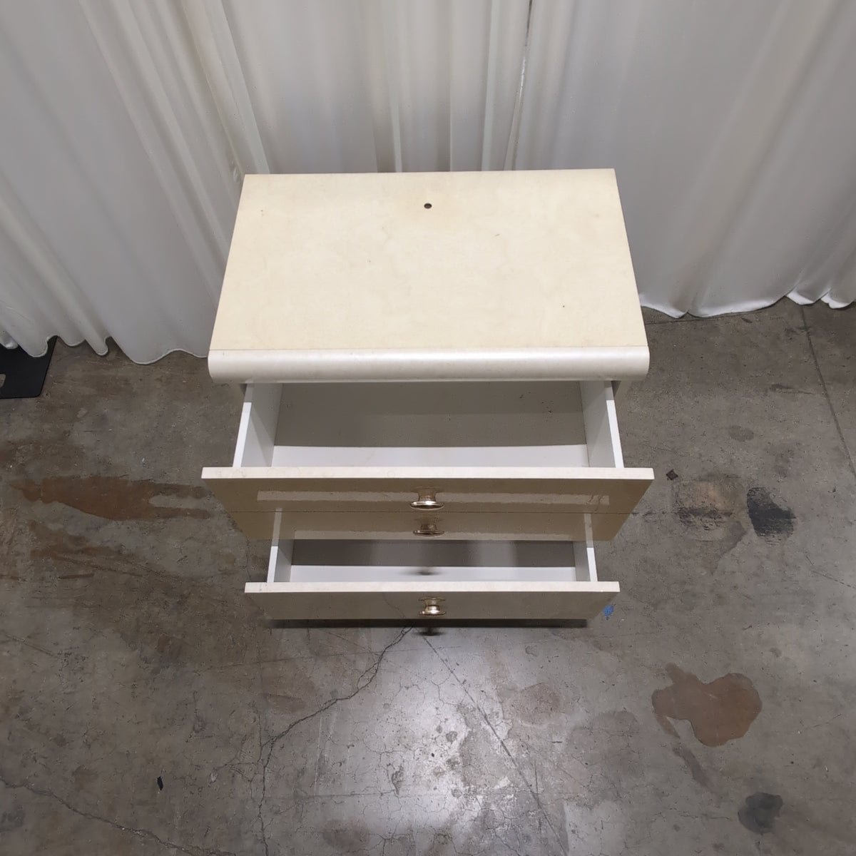 Light Burlwood Pattern Three-Drawer Nightstand with Gold Pulls