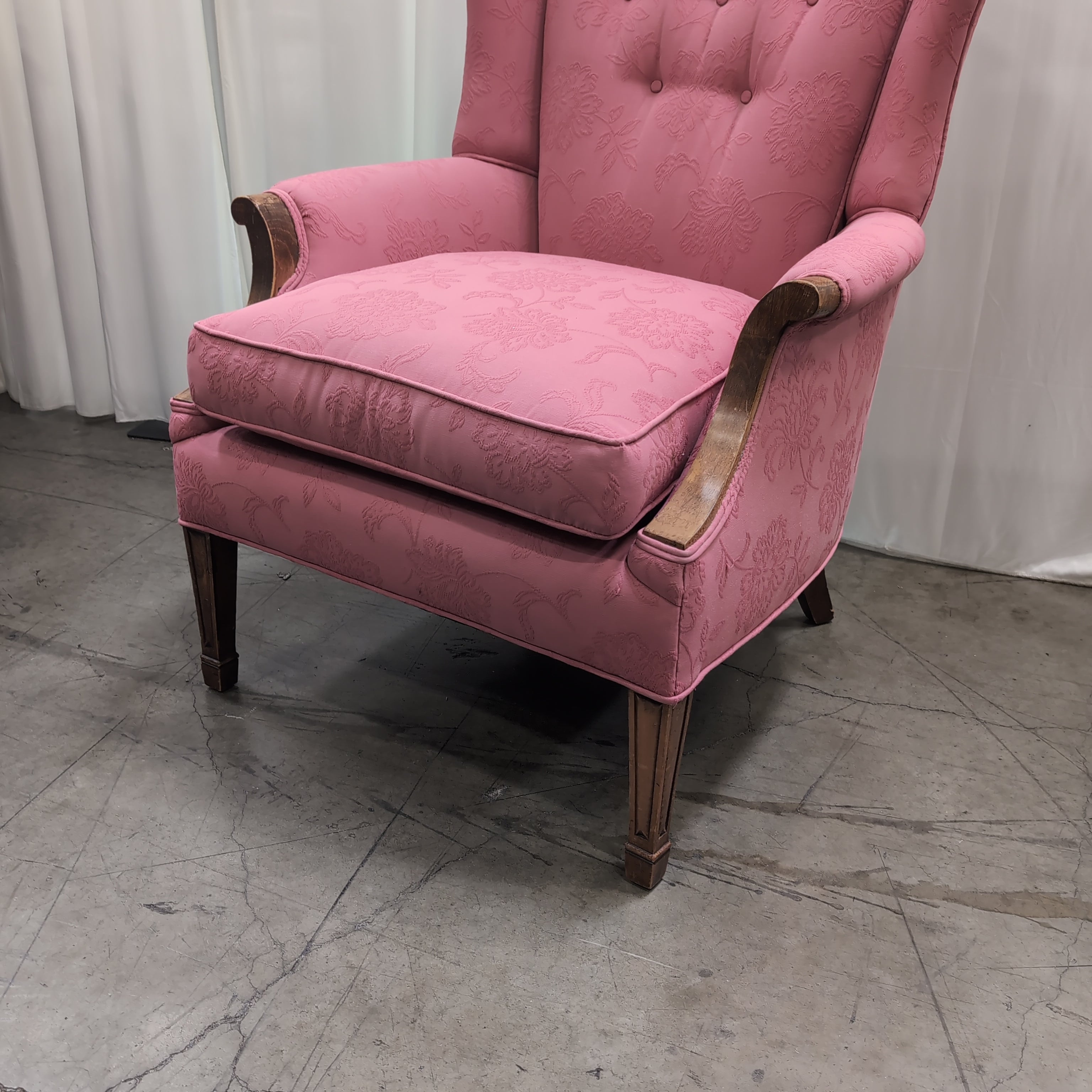 Pink Floral Upholstered Wingback Chair with Carved Wood Arms