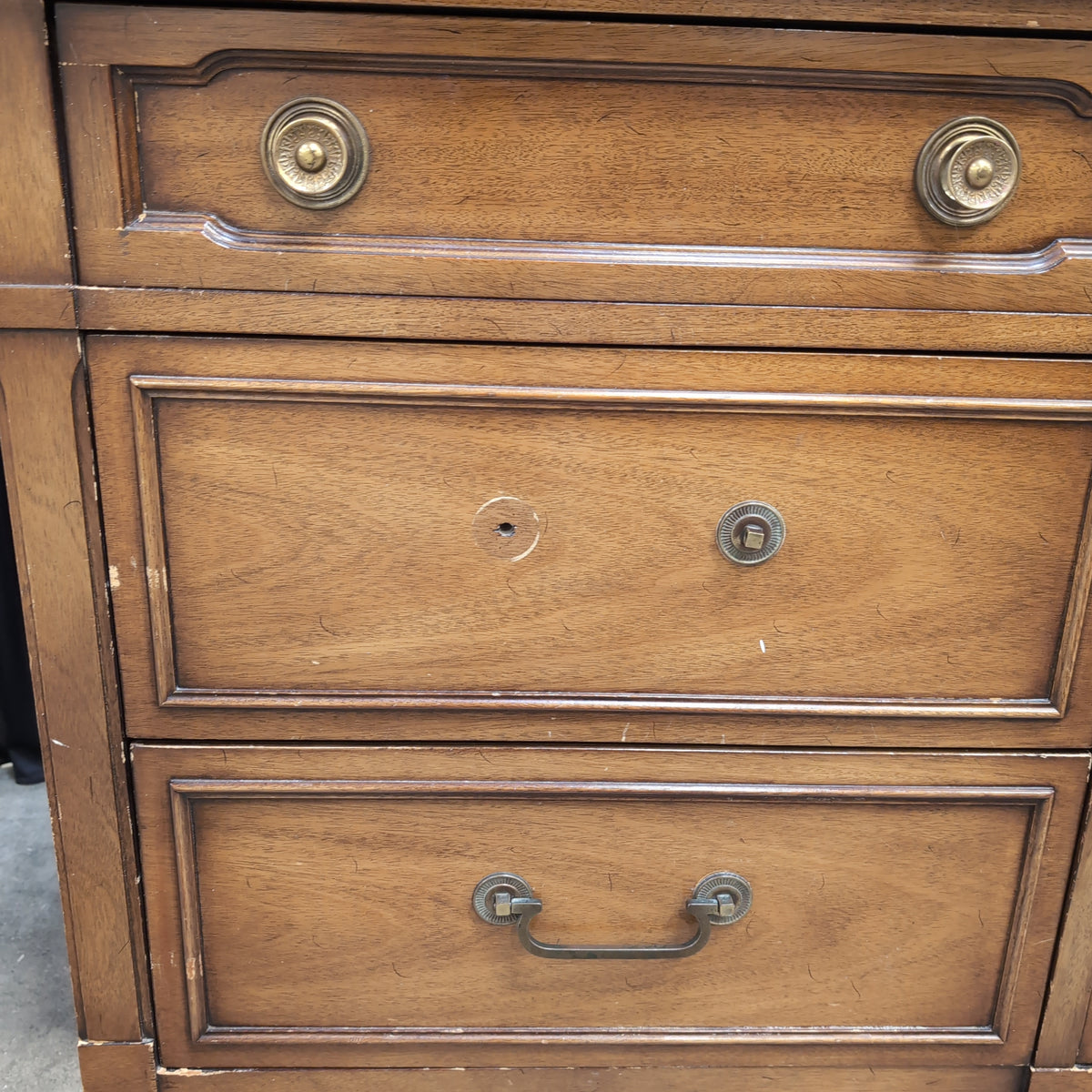 Traditional Wood Nine-Drawer Dresser with Ornate Hardware