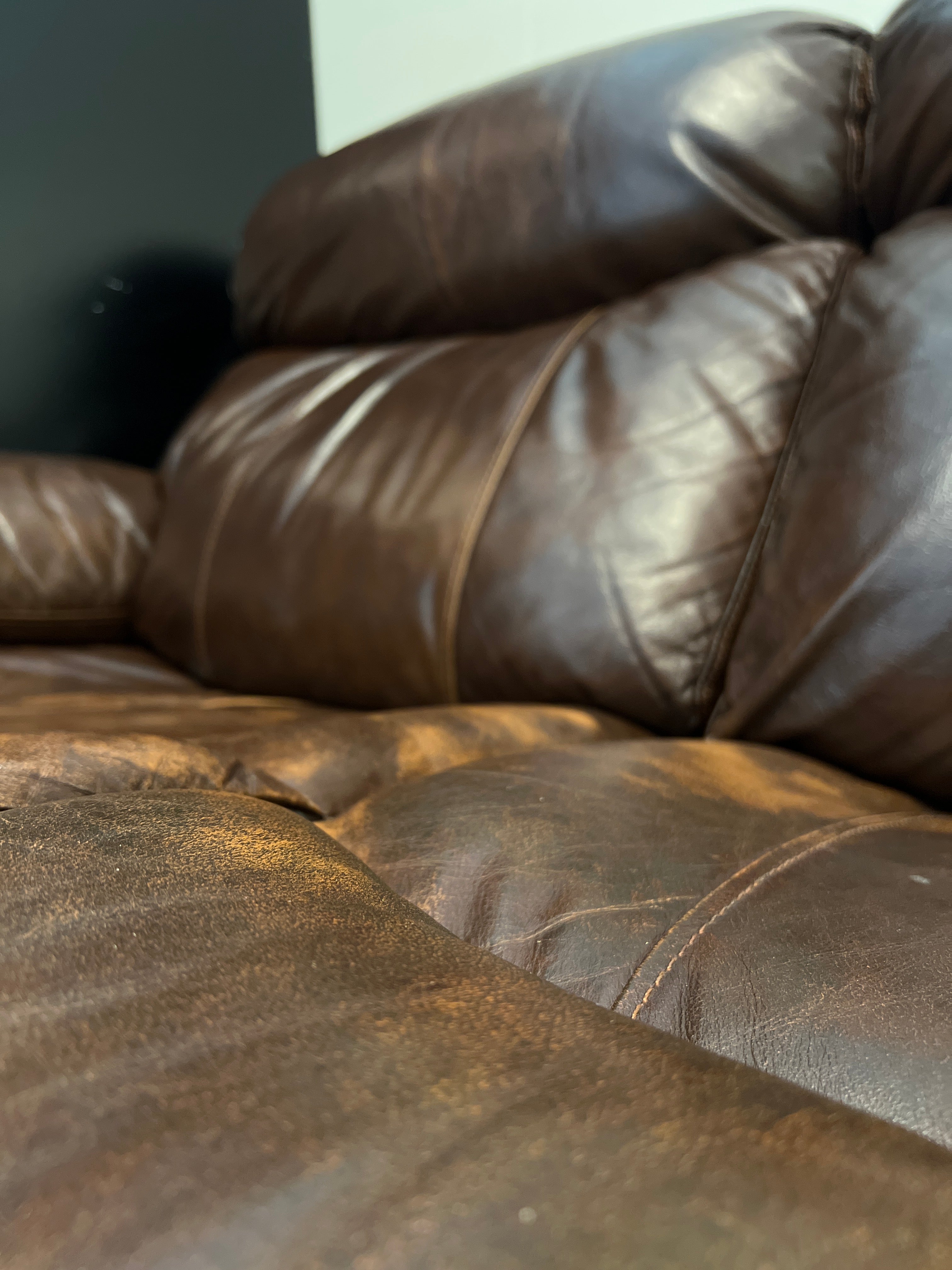 Brown Leather Reclining Sofa
