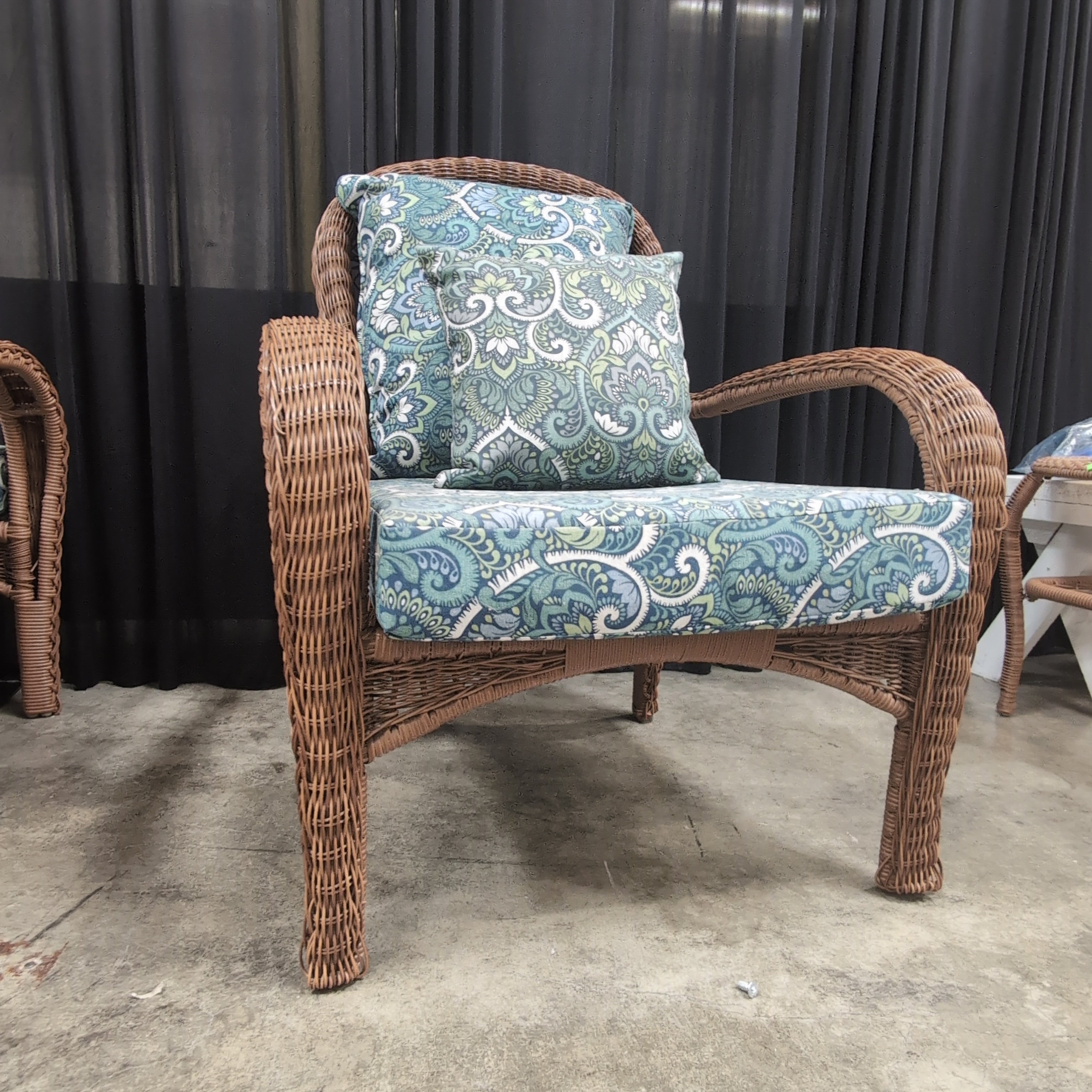 Pair of Brown Wicker Outdoor Chair with Patterned Cushions