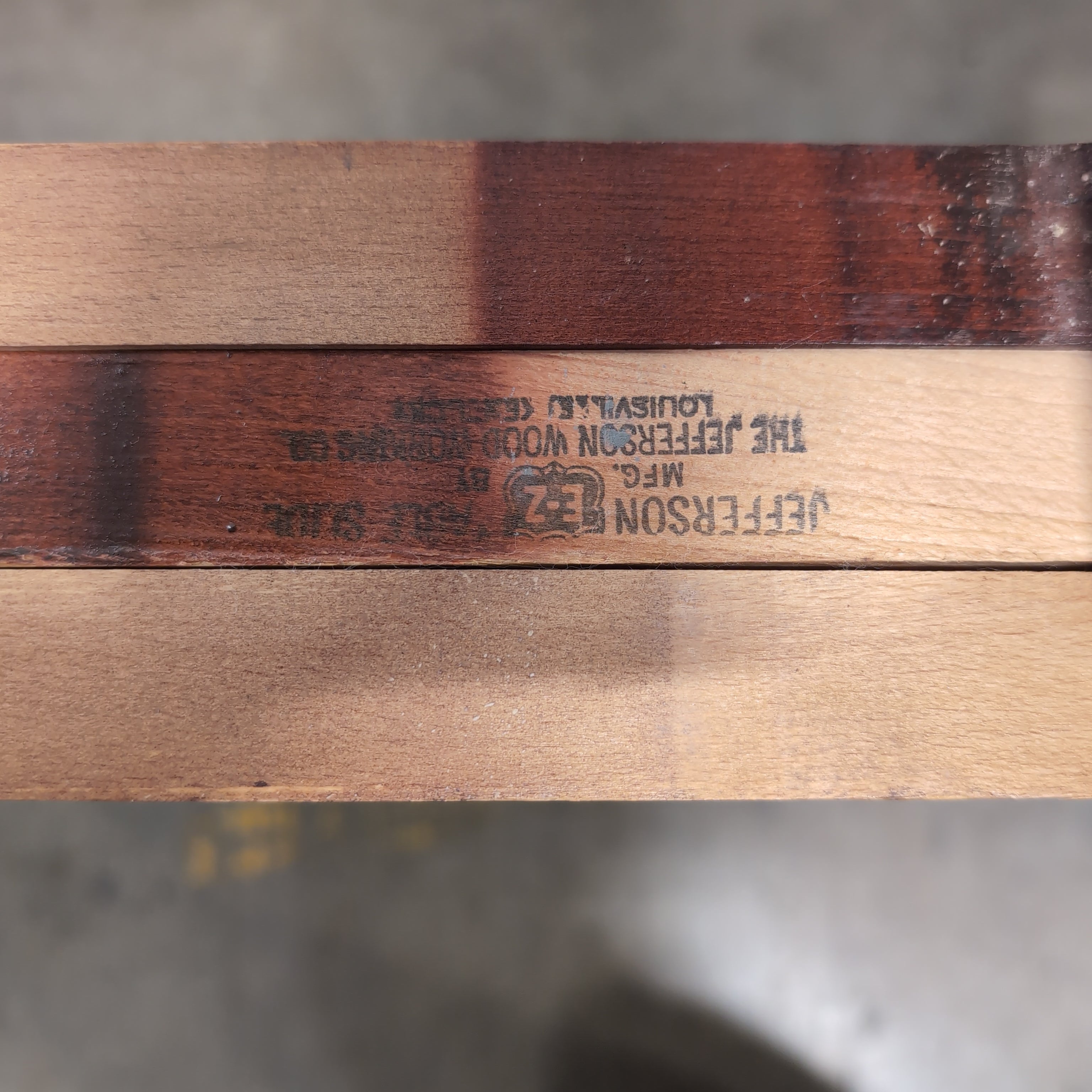 Reddish Brown Hardwood Dining Table with Rounded Corners