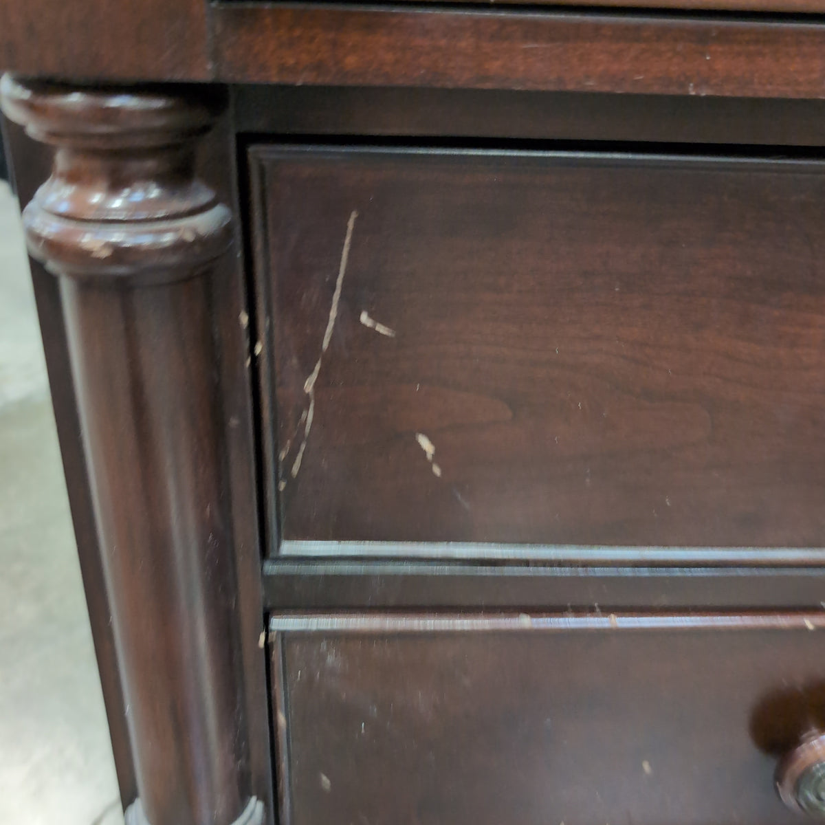 Dark Hardwood Three-Drawer Nightstand with Turned Columns