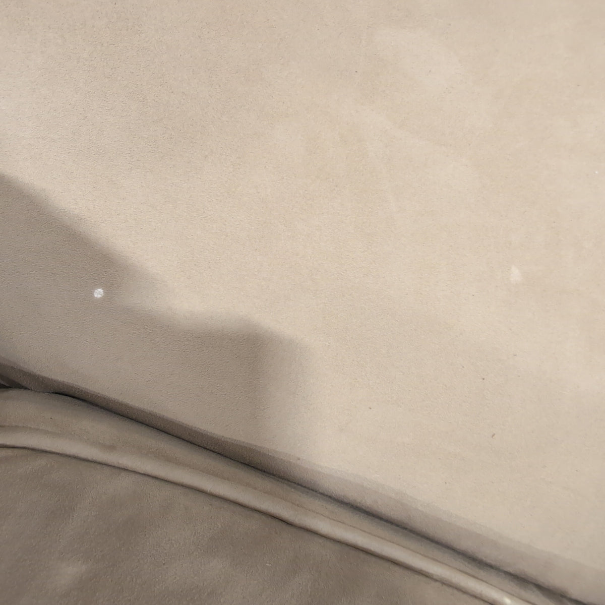 Tan L-Shaped Sectional Couch with Rolled Arms