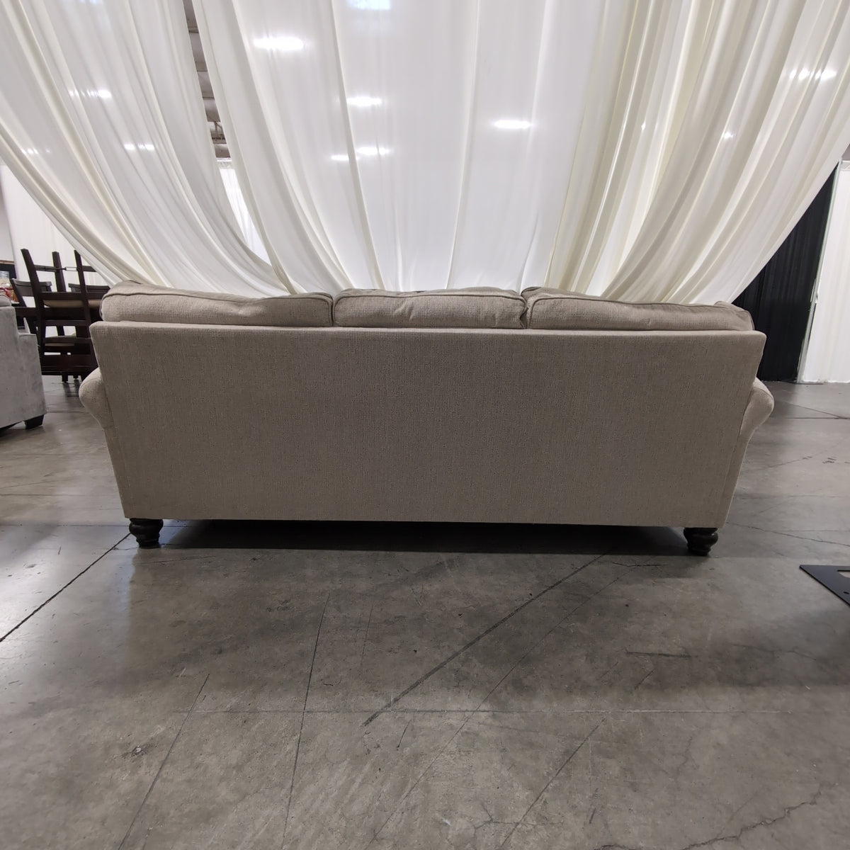 Light Beige Fabric Couch with Nailhead Trim