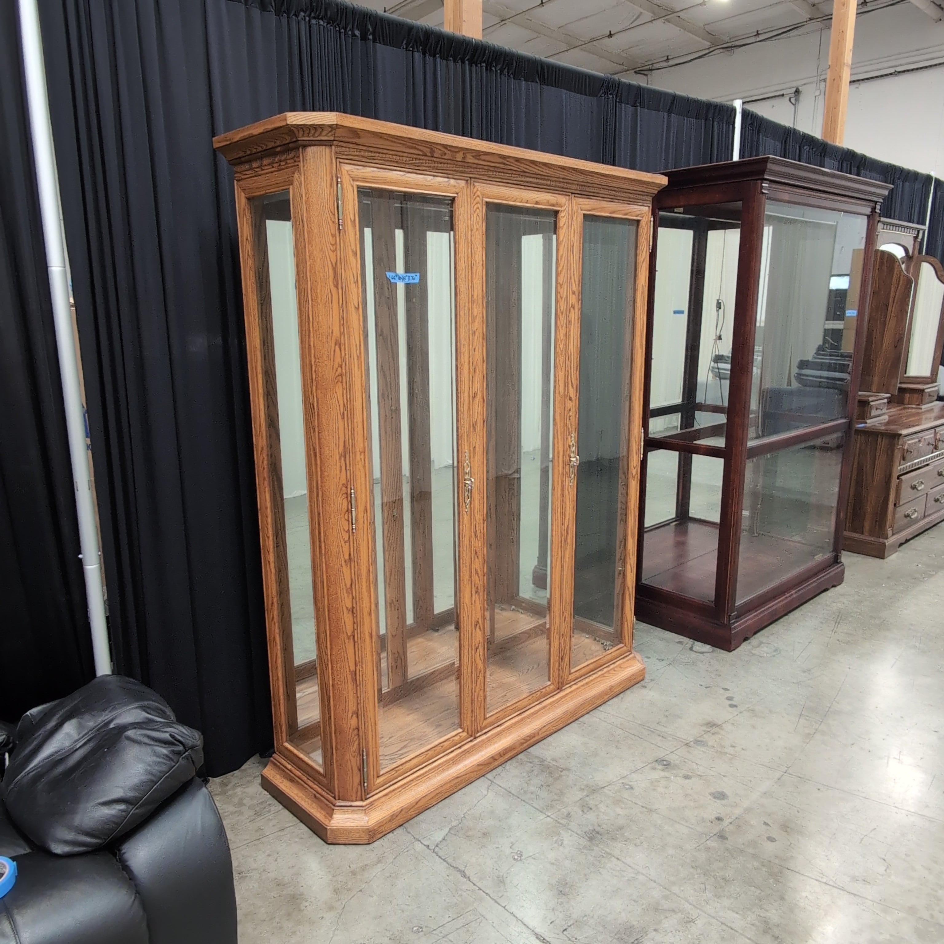 Oak Finish Three-Door China Cabinet with Crown Molding