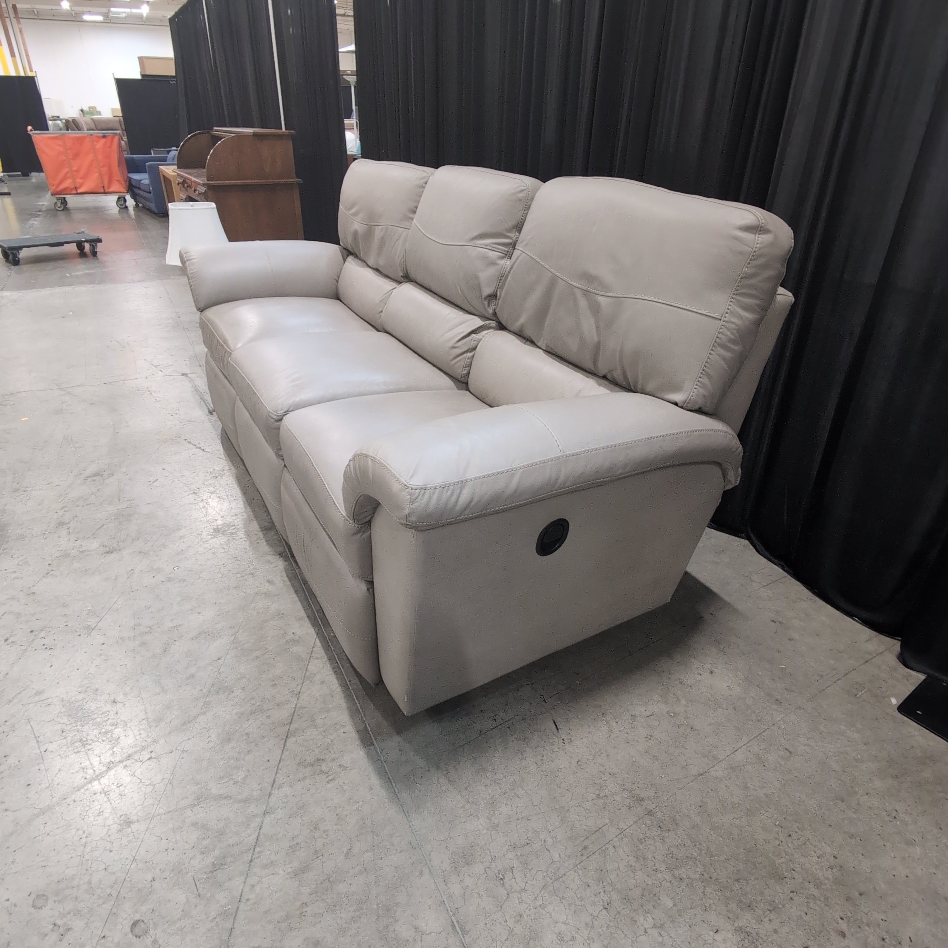 Padded Beige Reclining Three-Seat Couch in Faux Leather