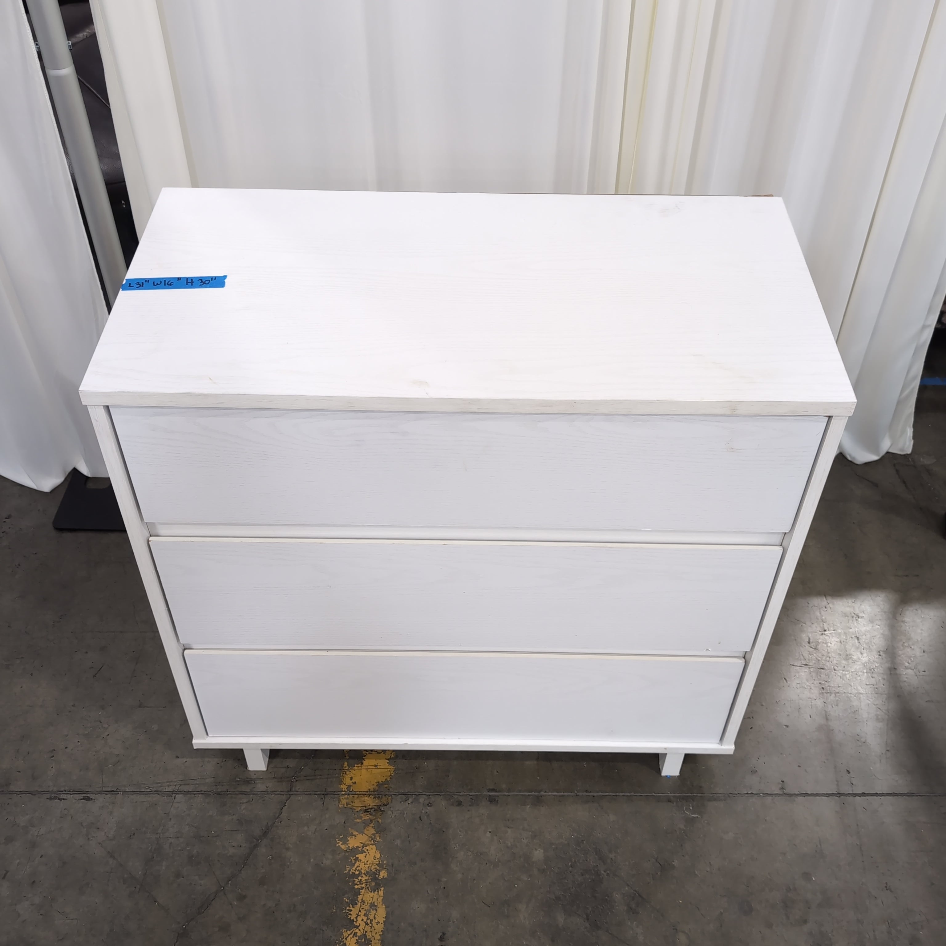 White Three-Drawer Dresser in Wood Finish