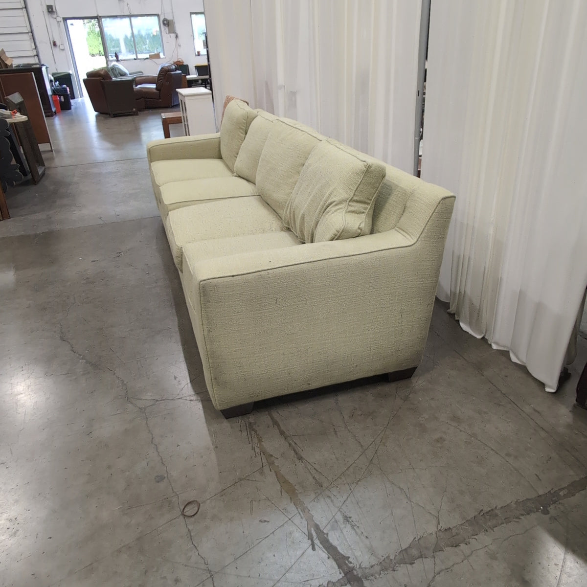 Light Green Upholstered Loveseat with Single Arm