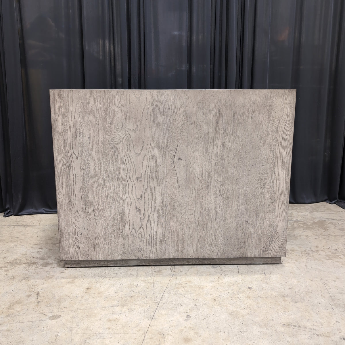 Light Wood Two-Drawer Nightstand with Textured Hardware