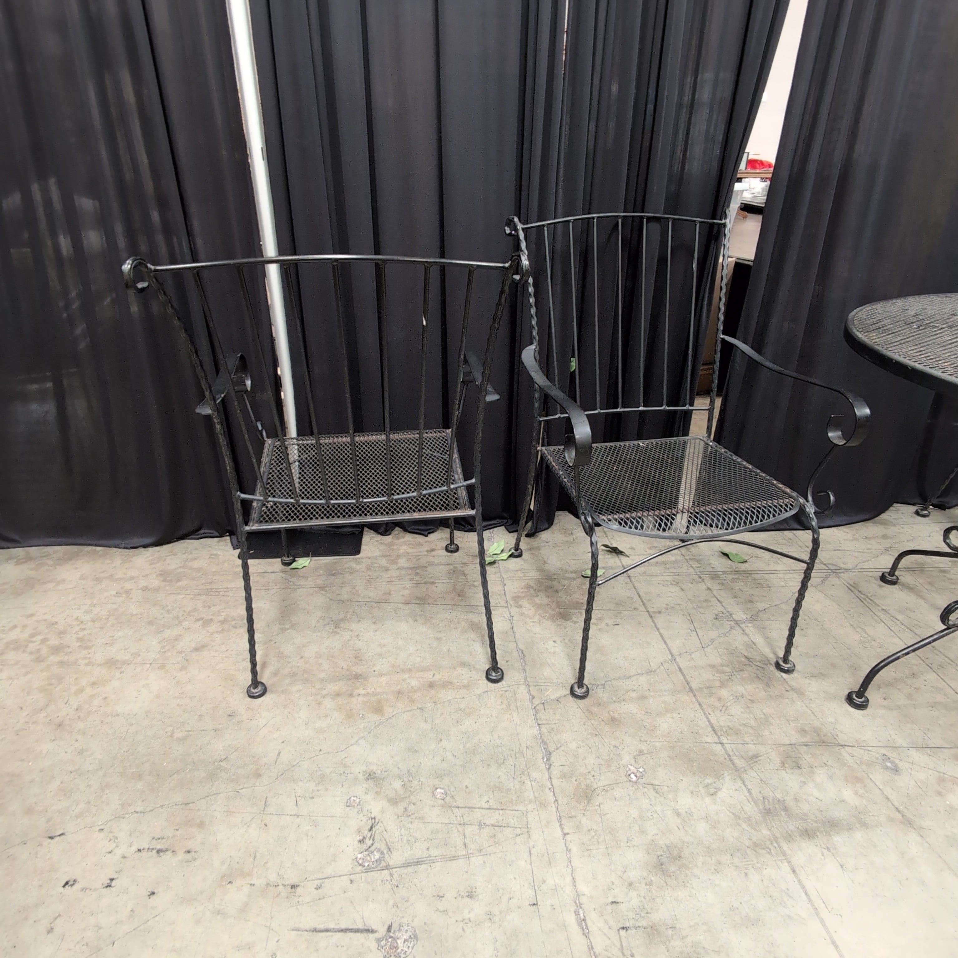 Black Wrought Iron Round Outdoor Table and Four Chairs