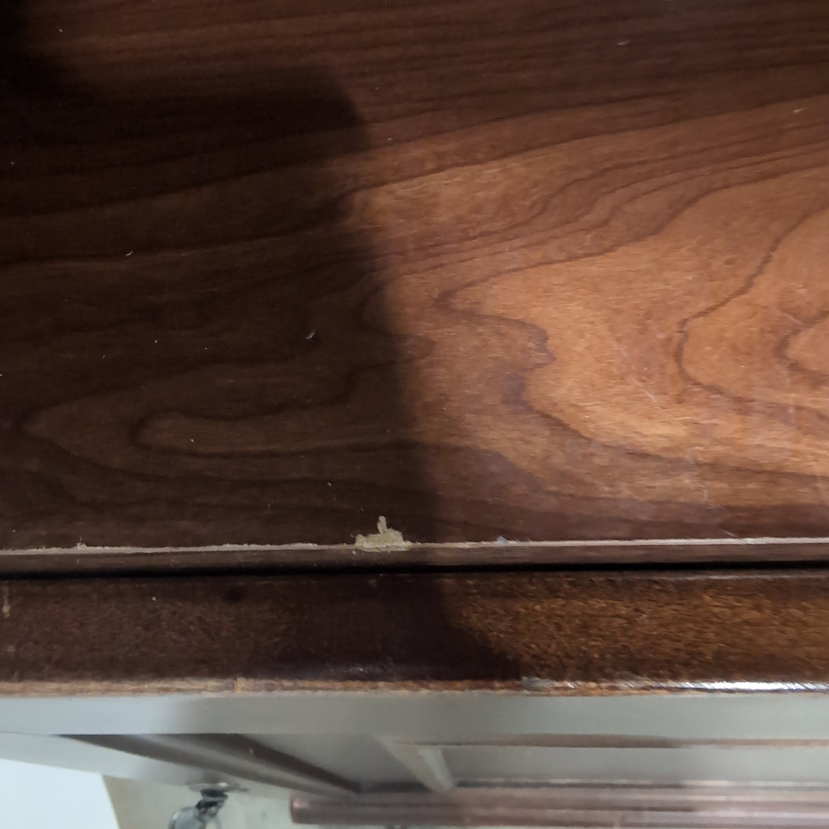 Brown Wood Bookcase with Crown Molding