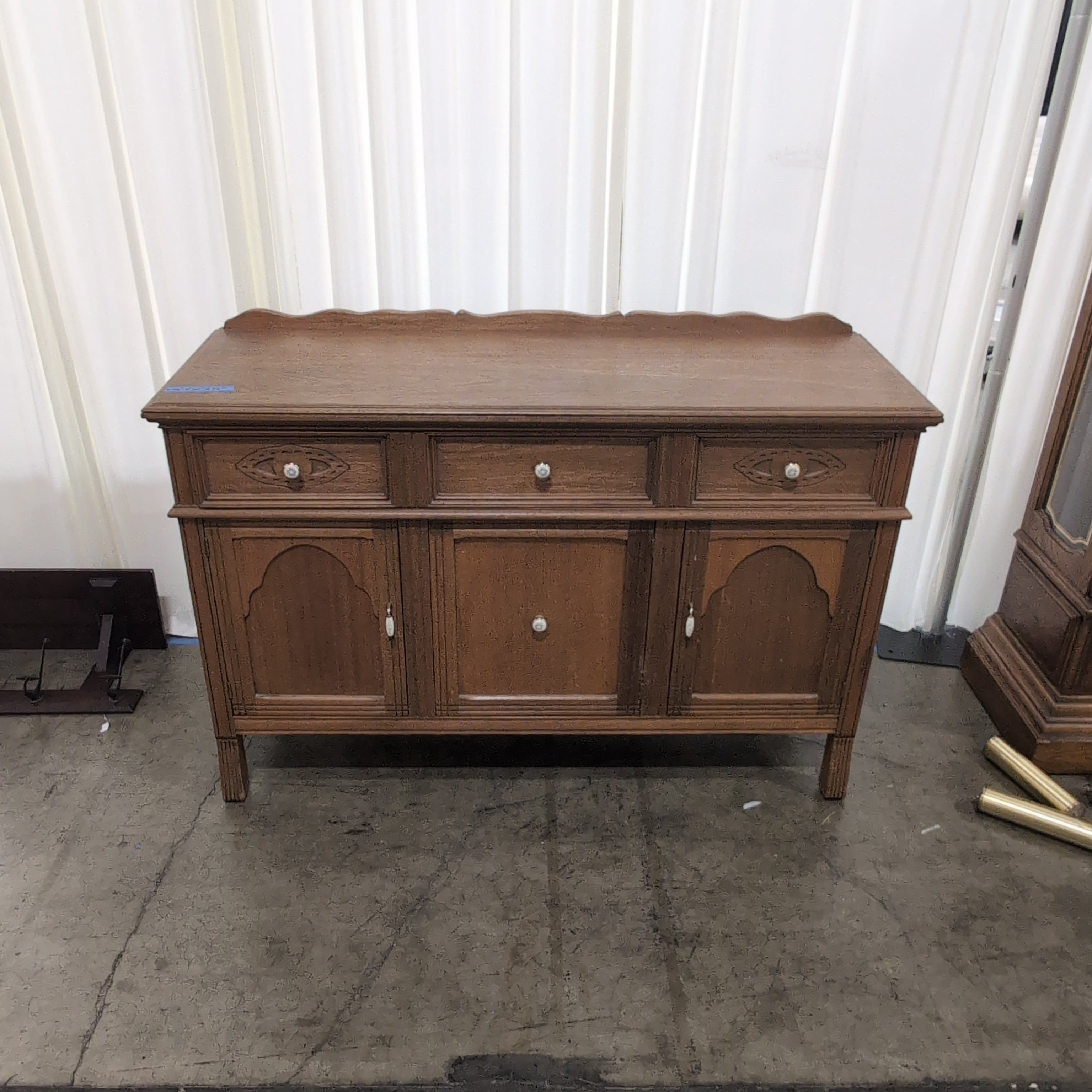 Ornate Light Wood Buffet with Decorative Pulls