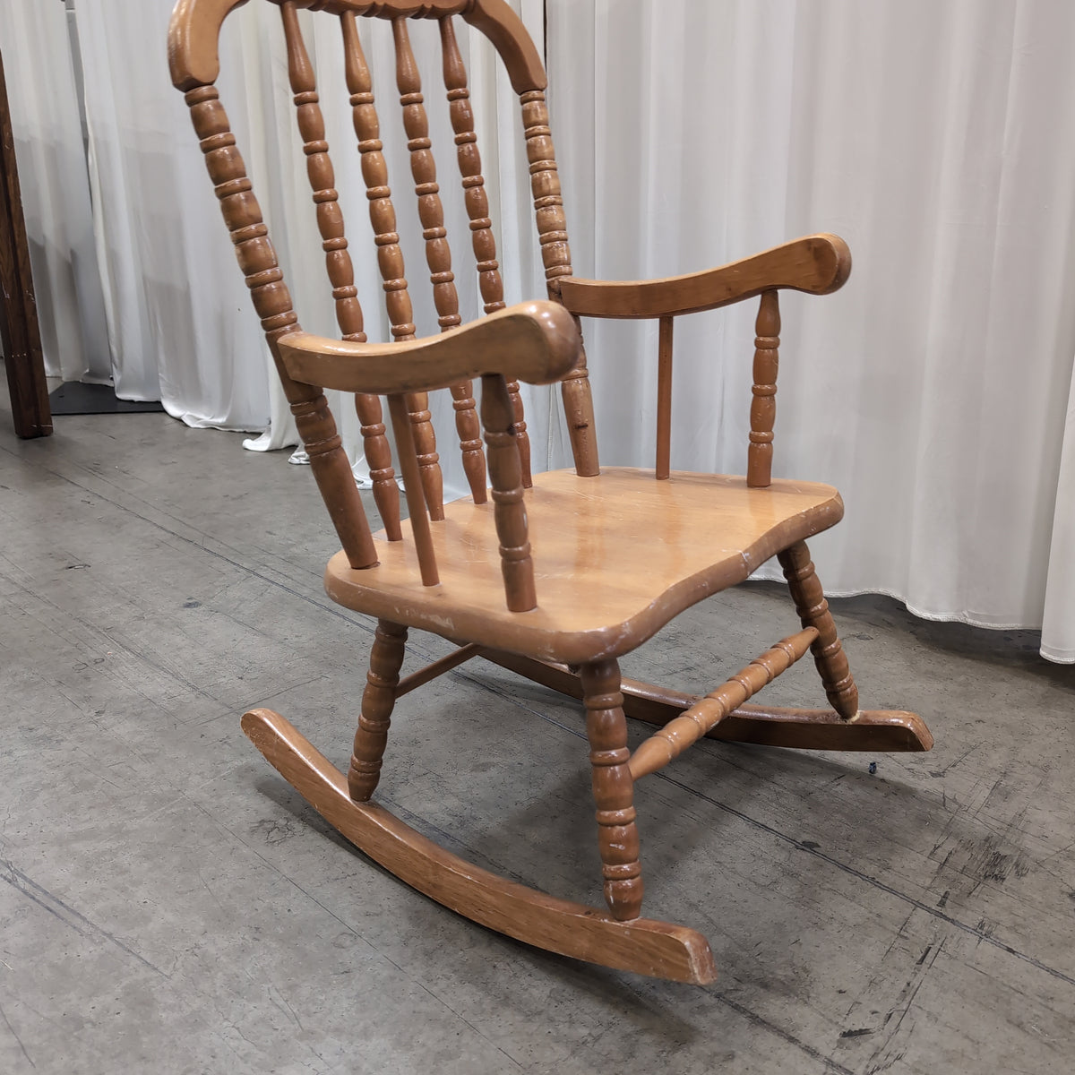 Small Traditional Spindle Back Wood Rocking Chair in Light Stain