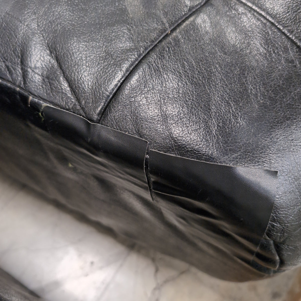 Black Tufted Leather Sectional Couch with Chrome Feet