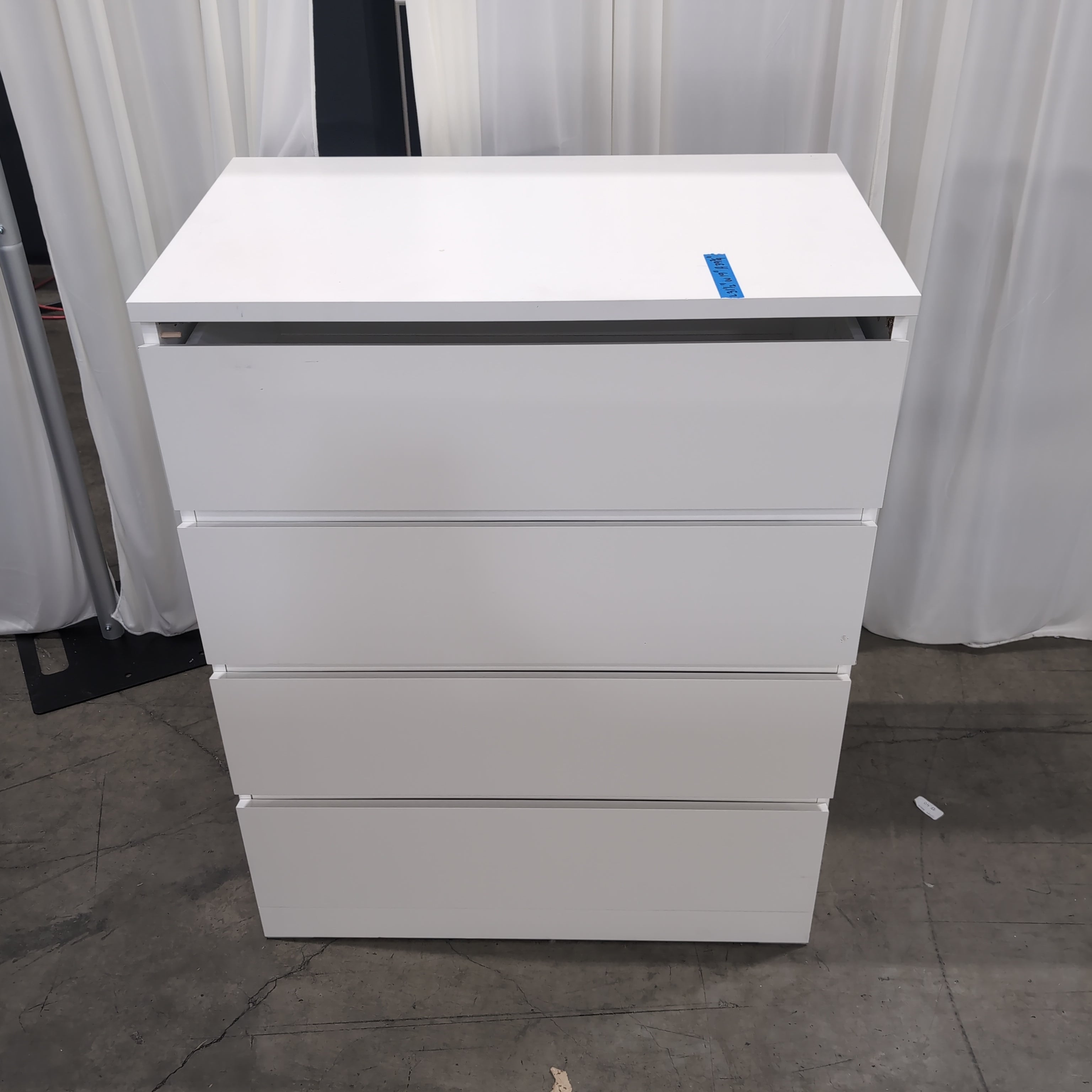 White Laminate Four-Drawer Dresser
