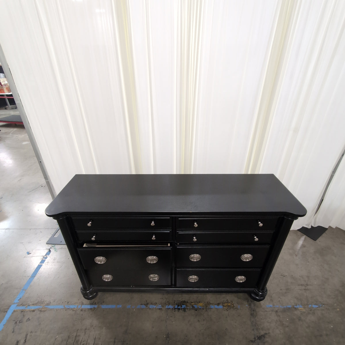 Black Eight-Drawer Traditional Dresser with Silver Hardware