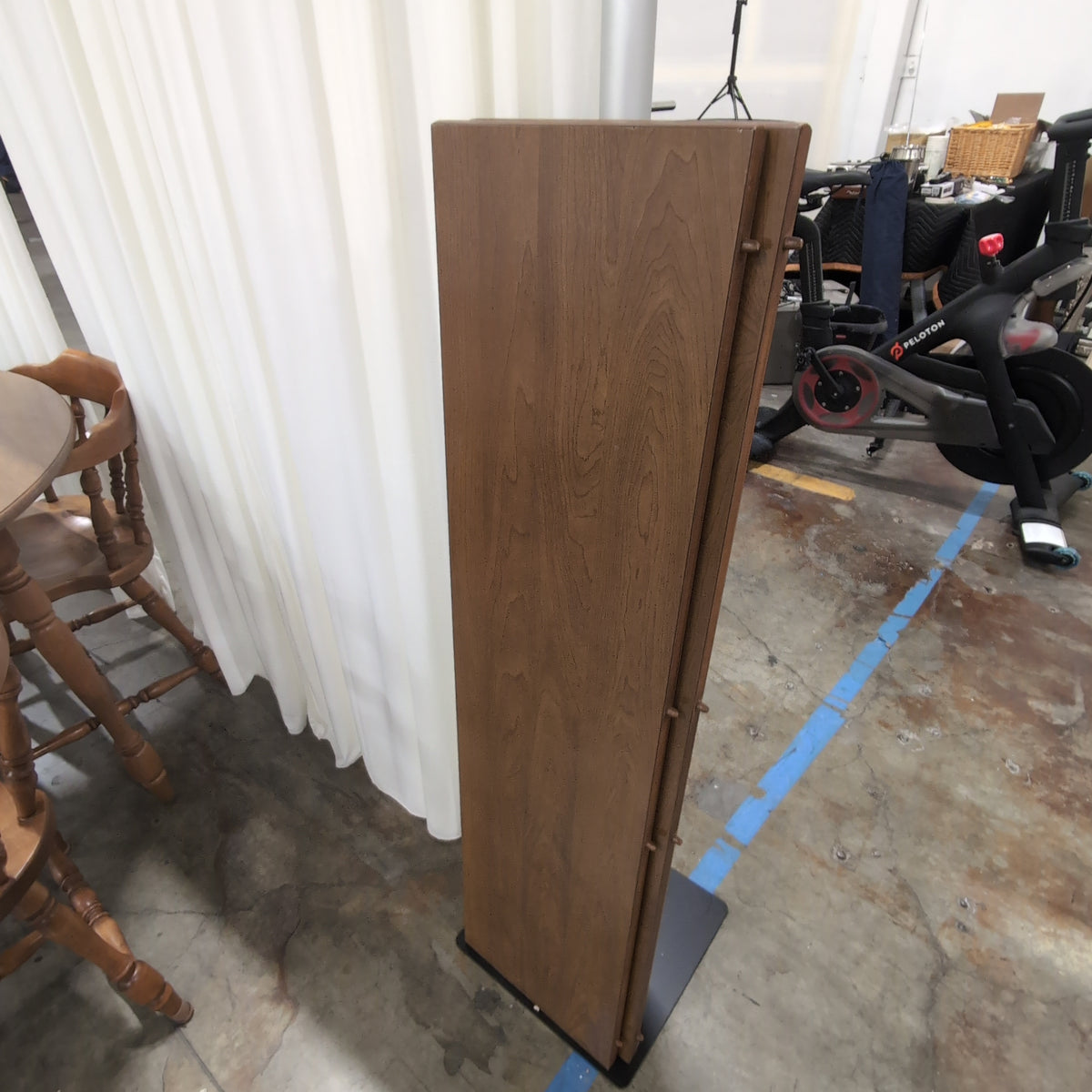 Round Medium Brown Wood Dining Table with Leaf Seam