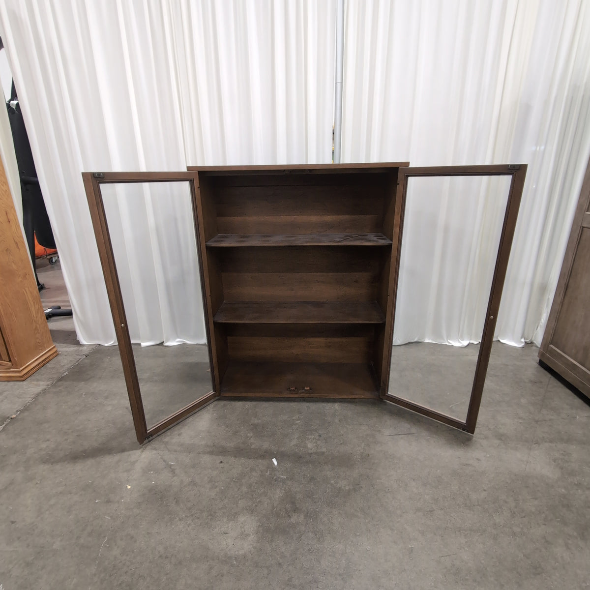 Brown Wood Two-Door China Cabinet with Glass Panels