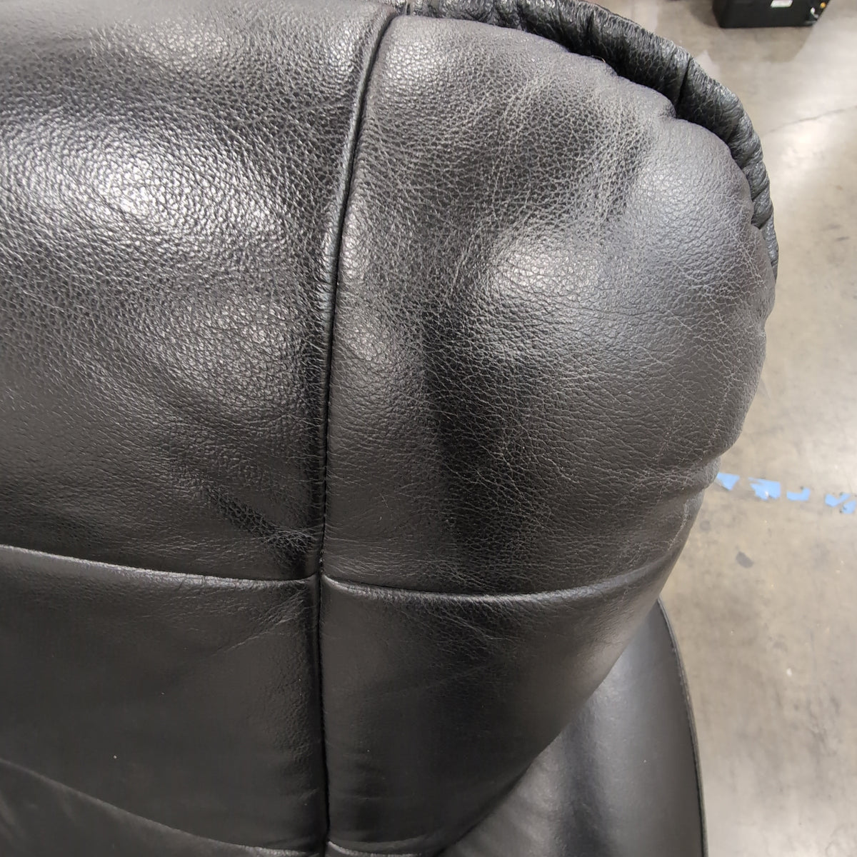 Black Tufted Leather Sectional Couch with Chrome Feet
