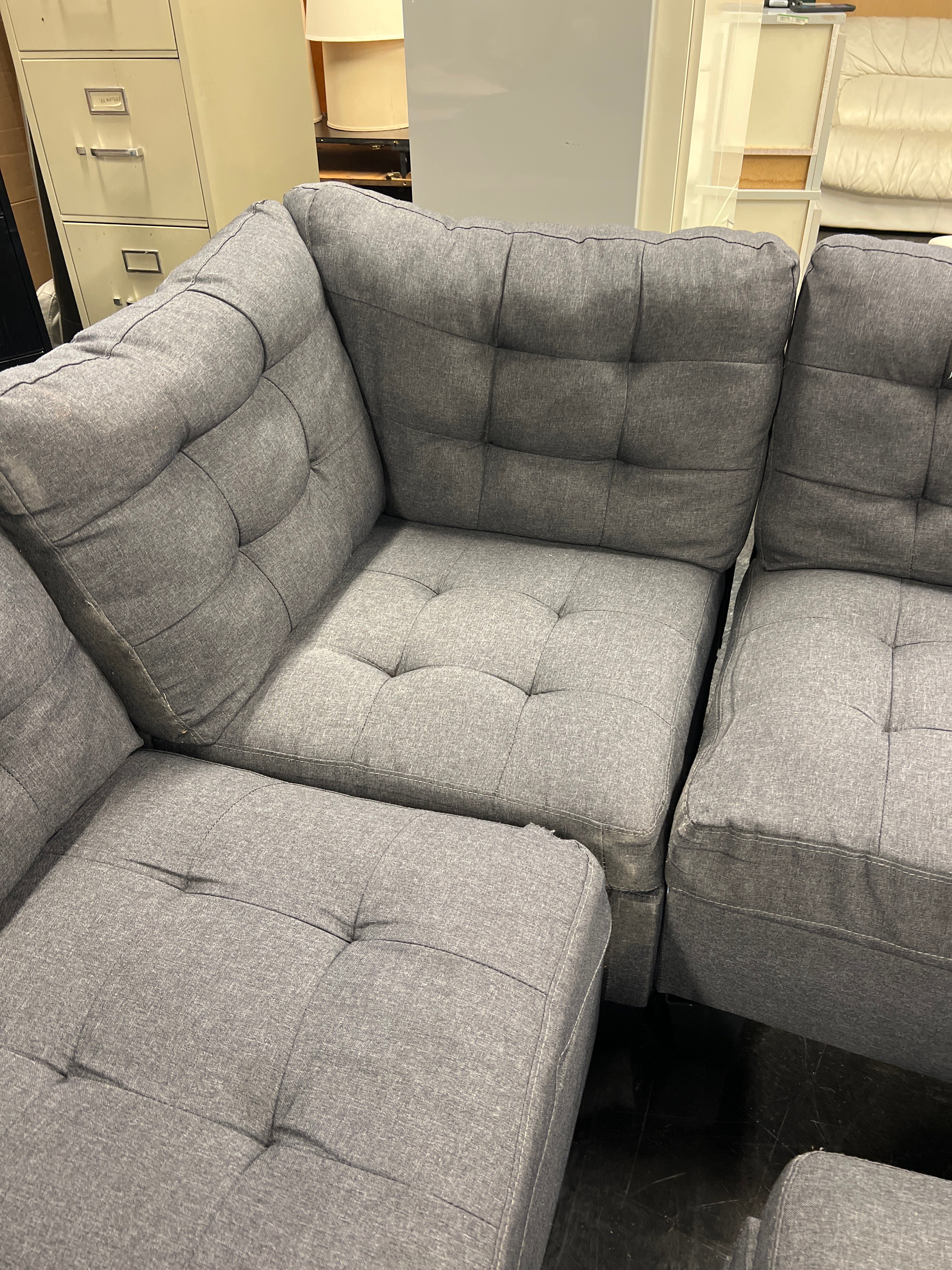 Dark Gray Upholstered Sectional with Ottoman