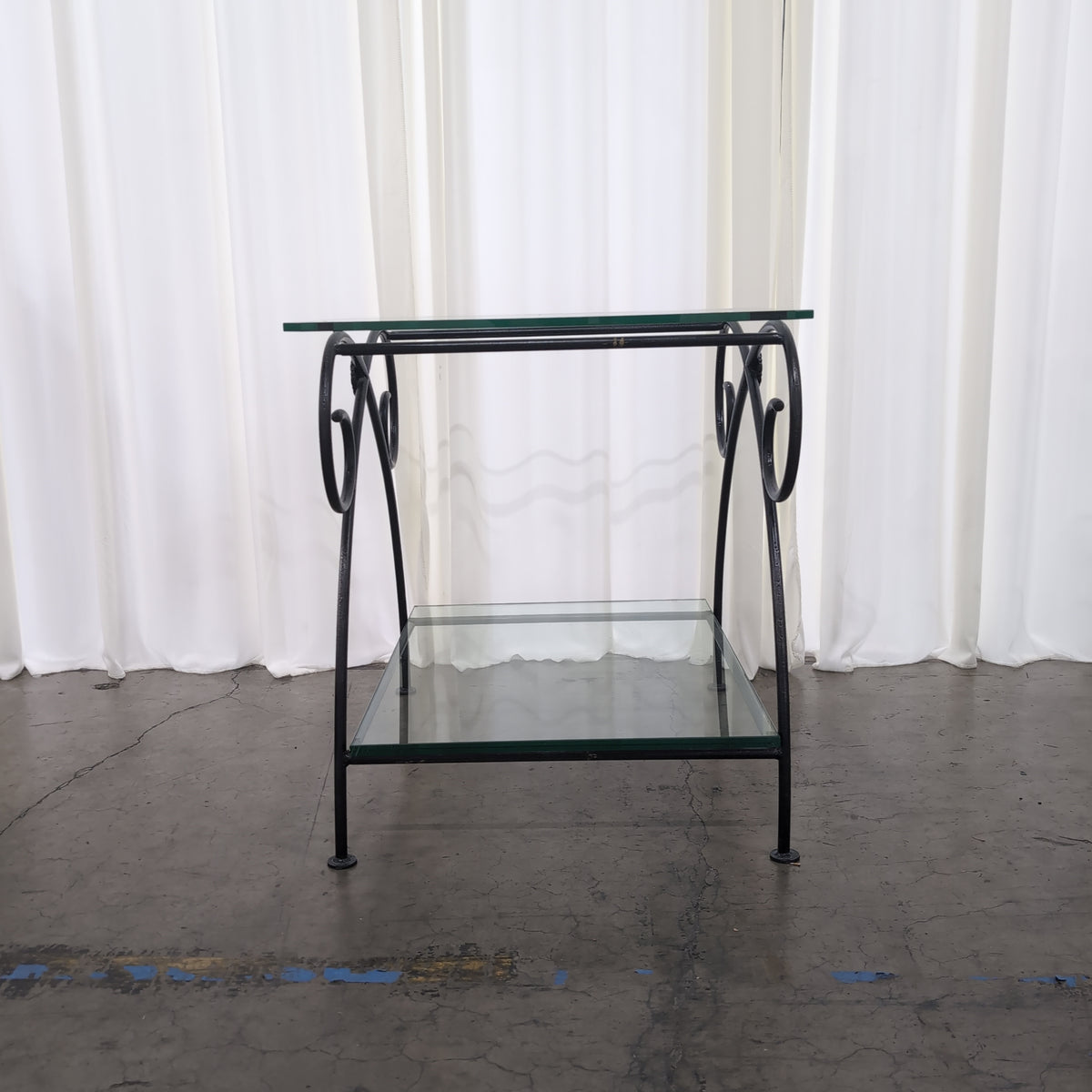 Dark Metal Two-Tiered End Table with Glass Shelves