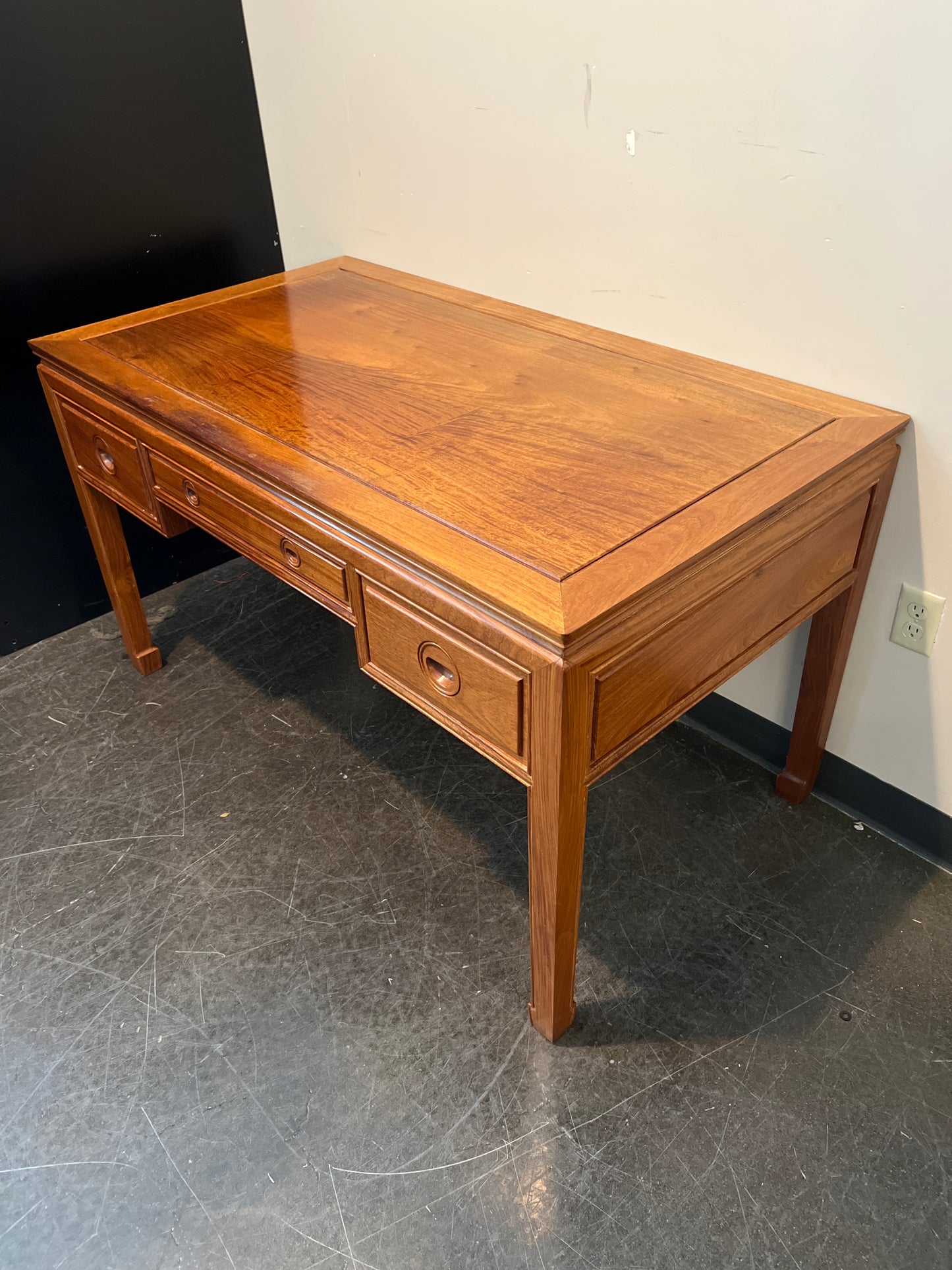Richly-Toned Wood Writing Desk with Three Drawers
