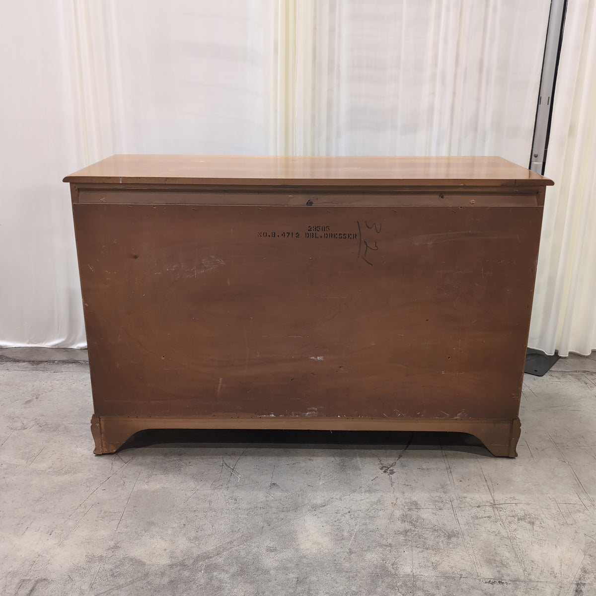 Traditional Honey Tone Nine-Drawer Dresser with Ornate Hardware