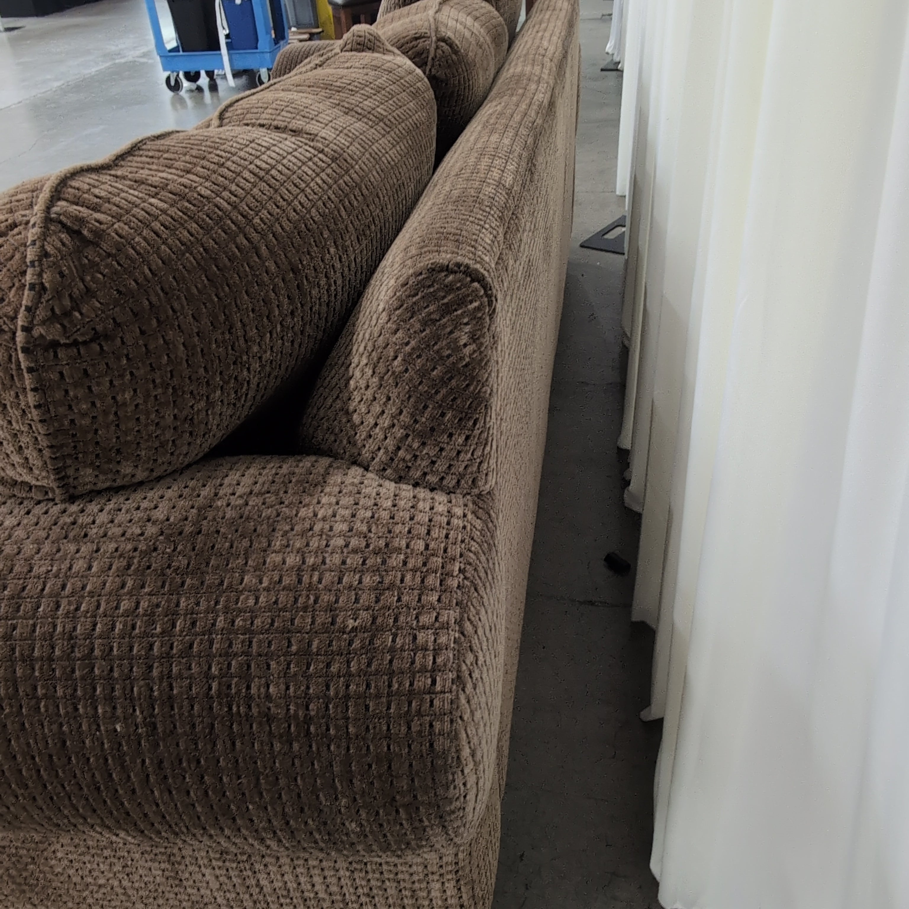 Brown Rolled Arm Three-Cushion Couch in Textured Fabric