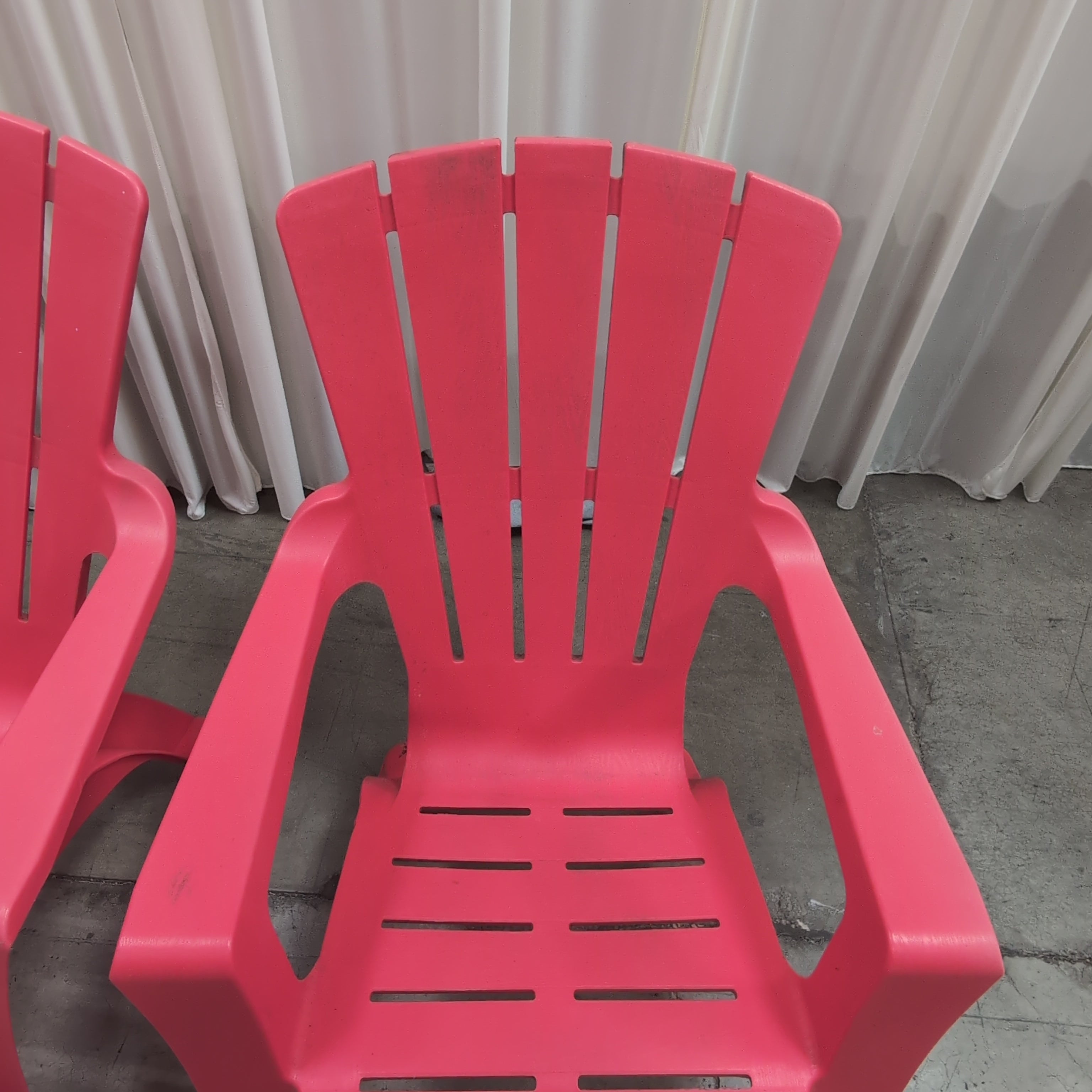 Pair of Red Plastic outdoor chairs
