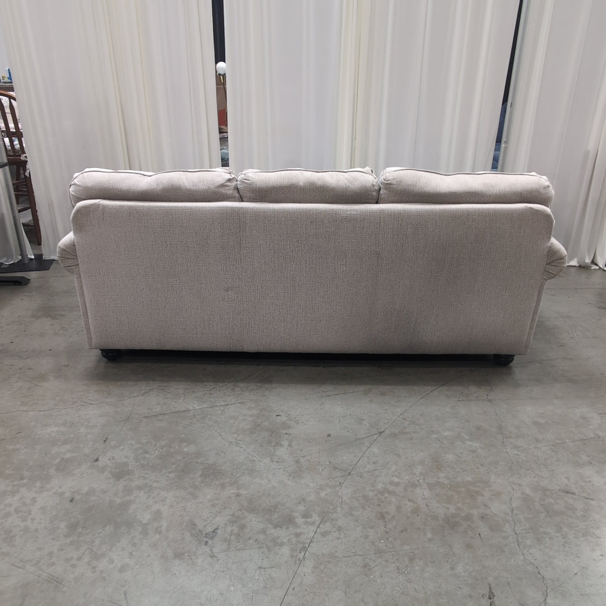 Light Beige Rolled Arm Couch with Nailhead Trim