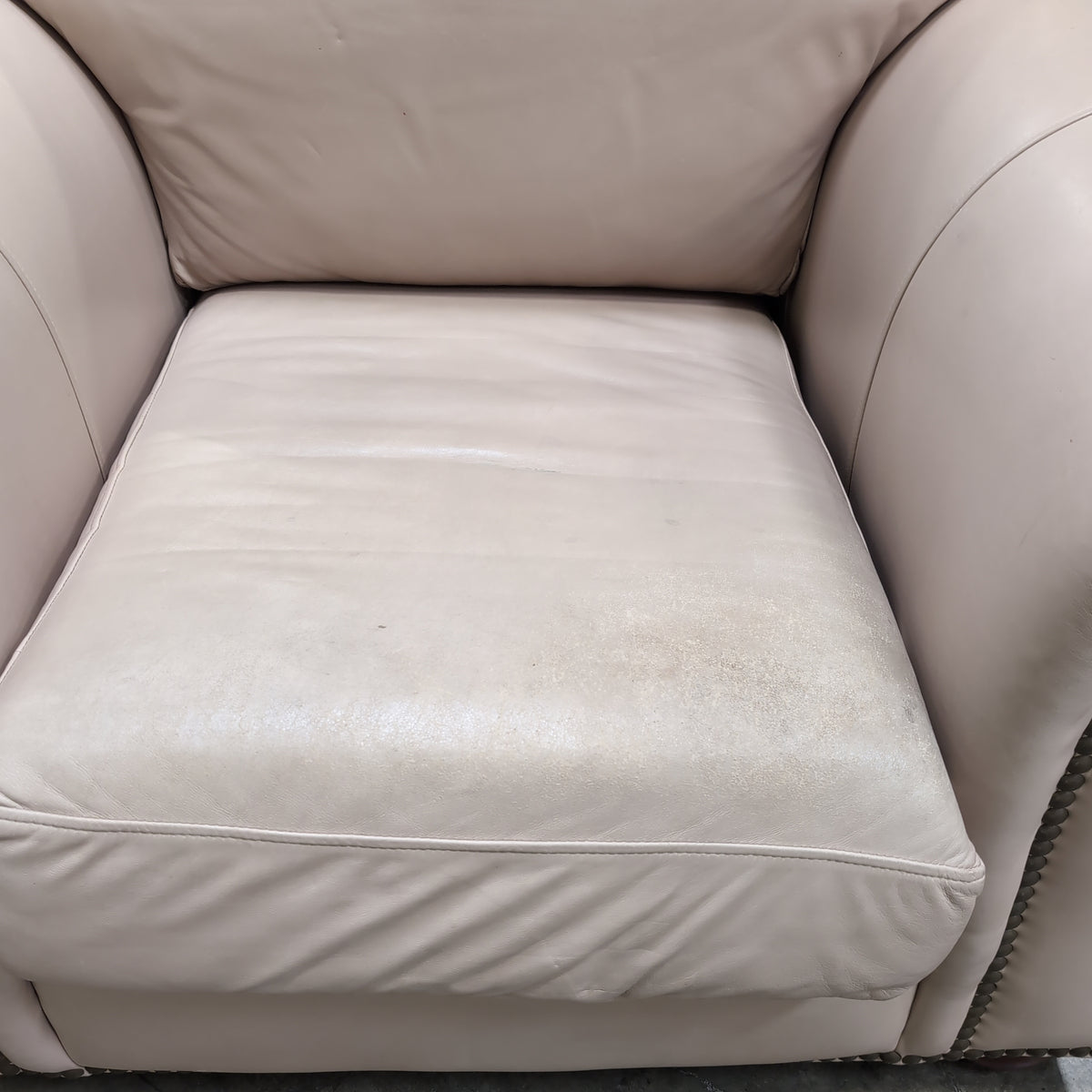 Padded Tan Armchair with Rolled Arms