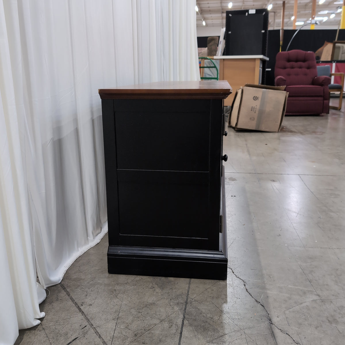 Two-Tone Black and Brown TV Stand with Louvered Doors